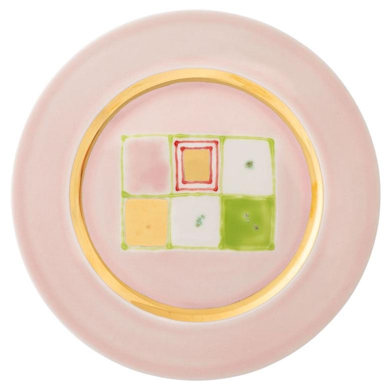 Assiette creuse en or rose