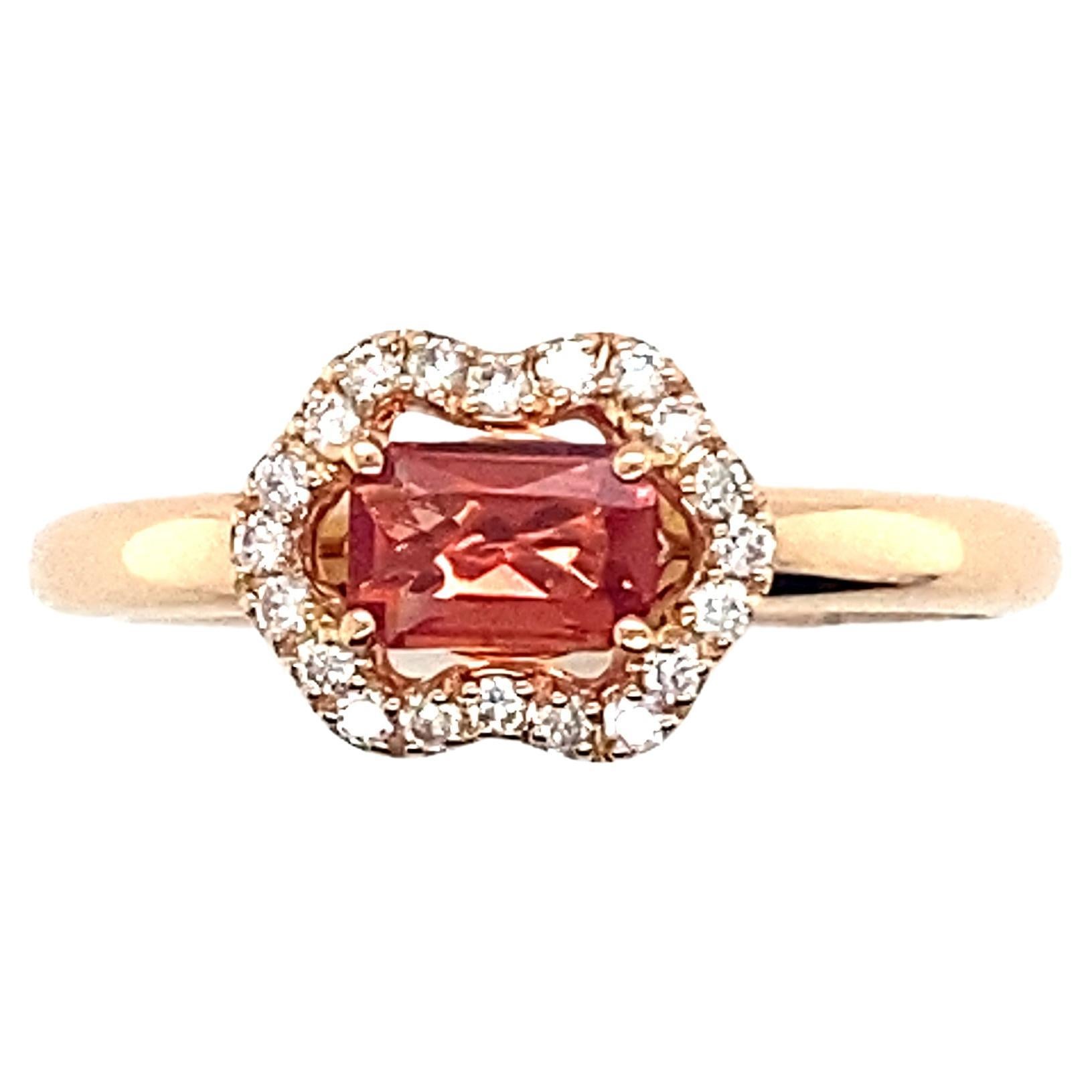 Modern Pink Gold Ring Accompanied by Orange Sapphire Surrounded by Diamonds For Sale