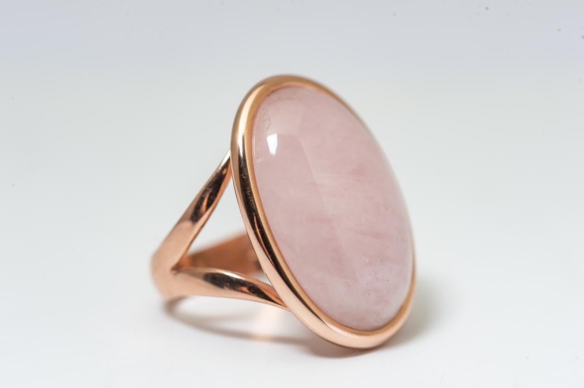 Pink Gold Ring Surmounted By a Pink Morganite Shape Cabochon .
A nacre plate adjusted under the stone gives it a profound and bright reflection.
There are 5.80 grams of 18k pink gold.