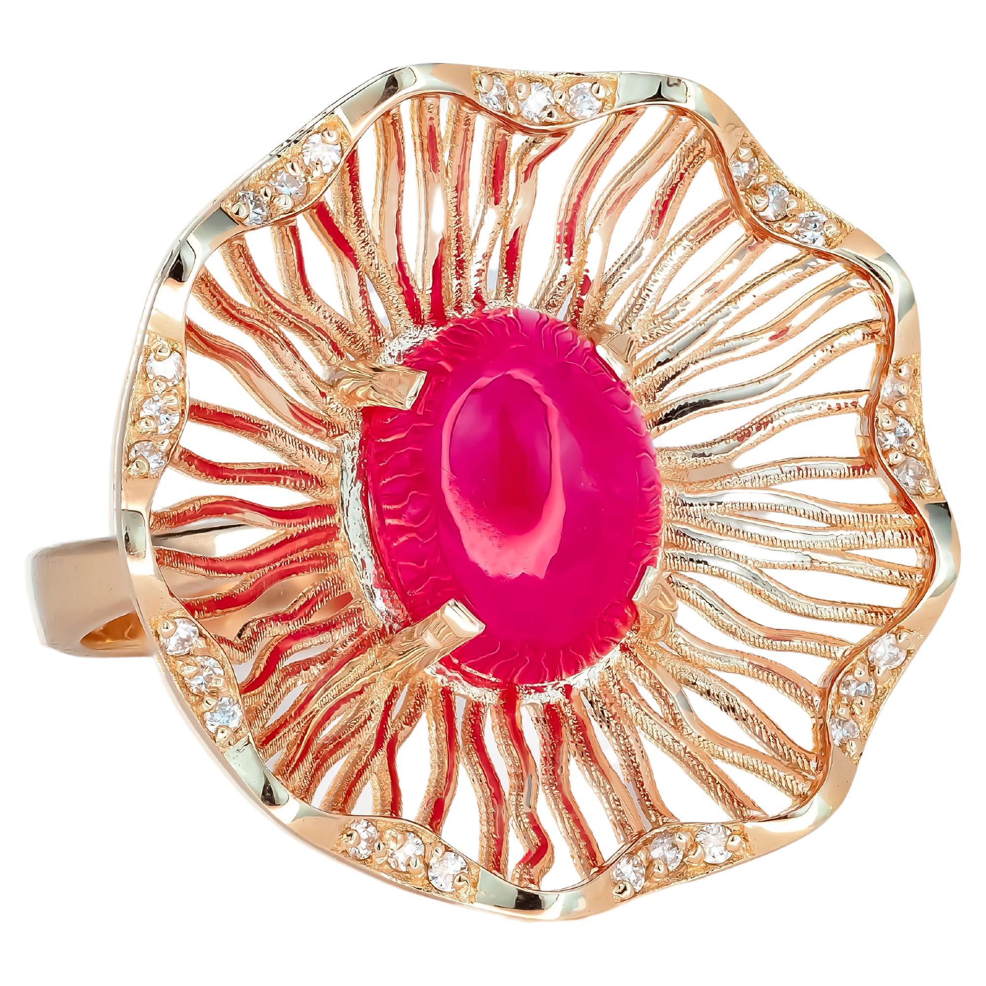 Bague en or rose avec  rubis et diamants.