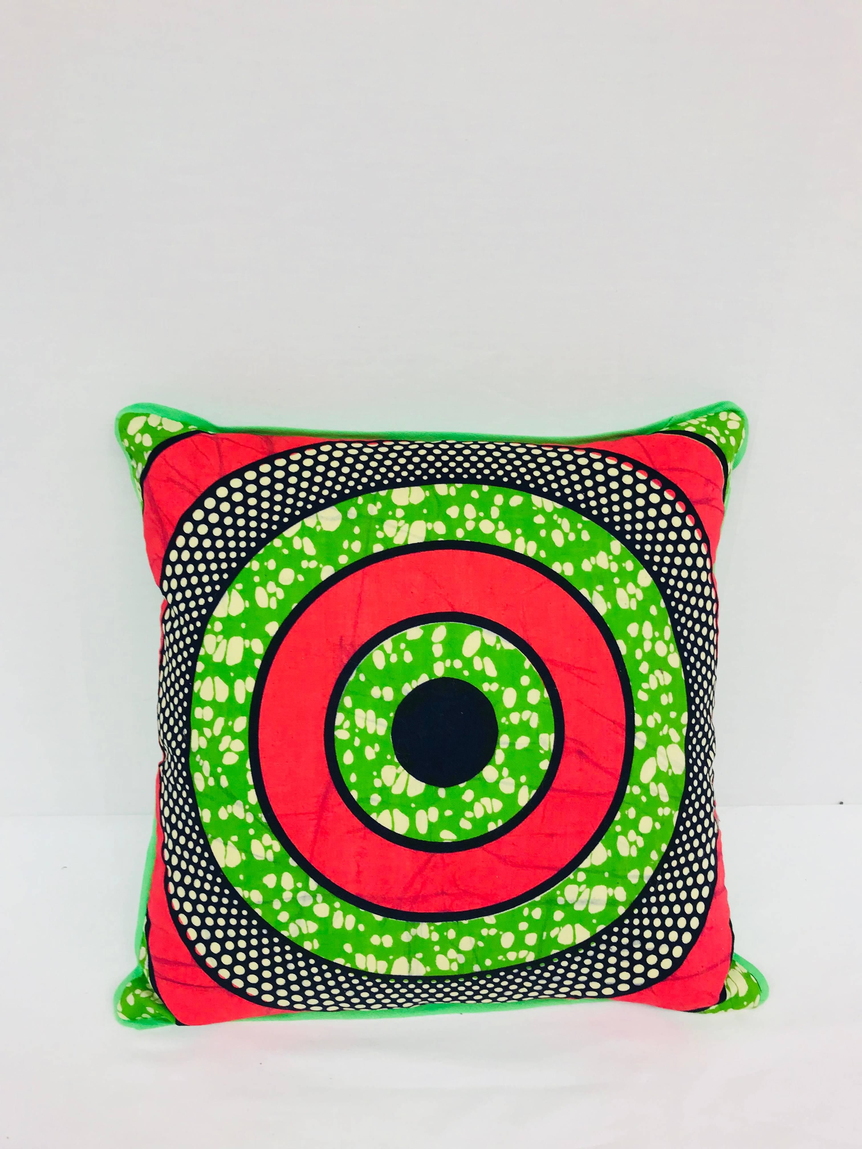 Crafted exclusively for Madcap Cottage in the USA, this African wax print pillow will bring a big dollop of delicious to a neutral sofa, bed, or chair. Back in a kicky green hue. Made from Vlisco authentic Dutch Wax fabrics. Hidden zipper. Down