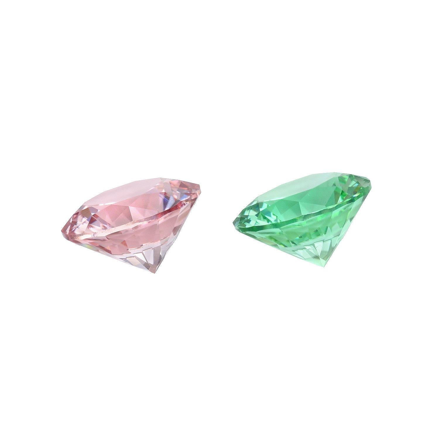 Perfectly mismatched pair of Pink and Green Tourmaline unmounted round gemstones, weighing a total of 1.96 carats. 
Dimensions: 6.7mm.
Returns are accepted and paid by us within 7 days of delivery.
We offer supreme custom jewelry work upon request.
