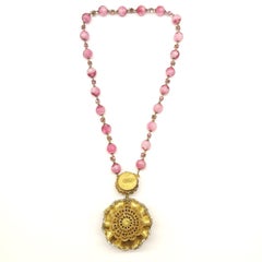 Pink hand blown glass bead and paste 'rosette' pendant, Miriam Haskell, 1960s