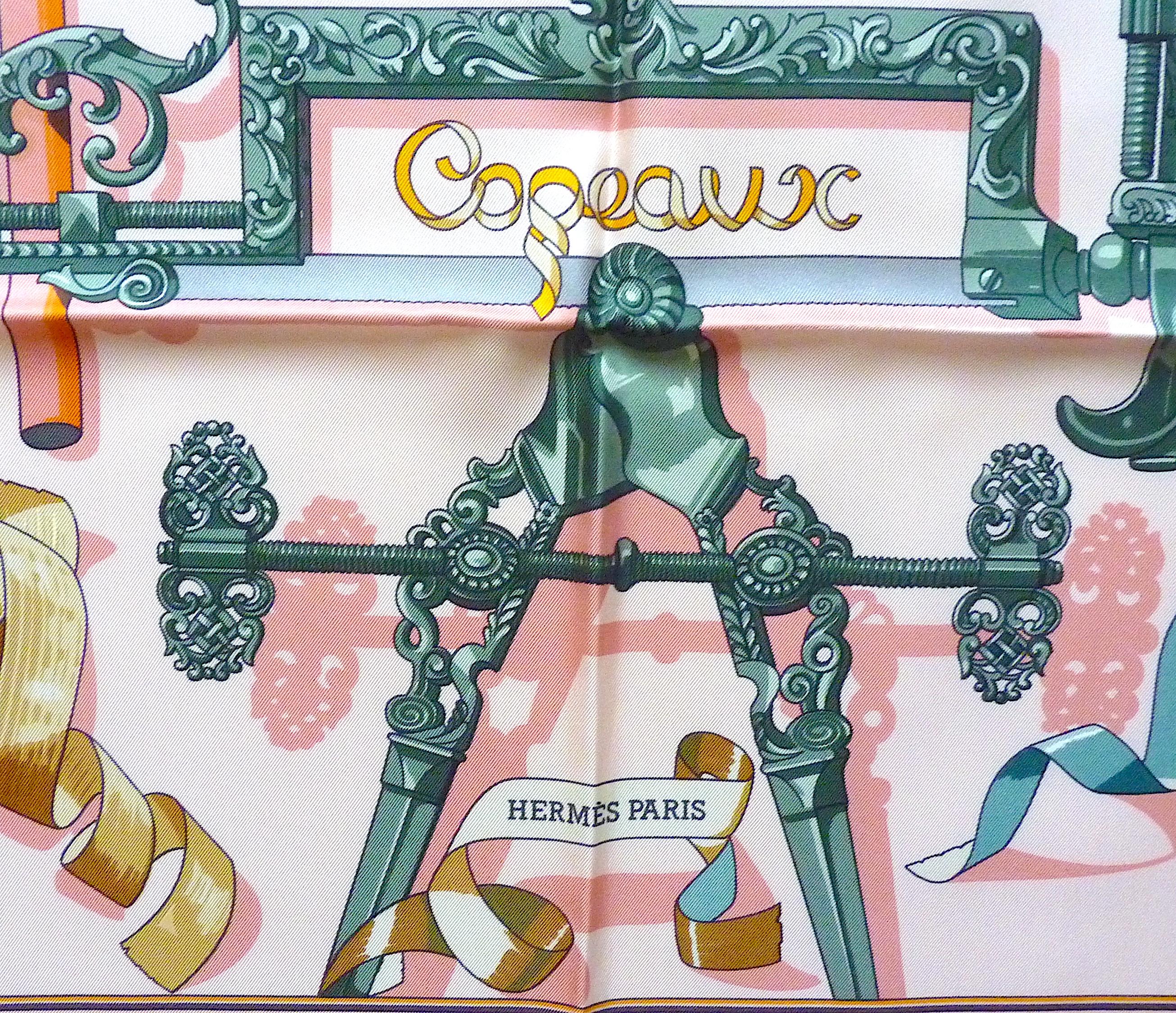 HERMES Scarf Copeaux by Caty Latham,  Never Worn, only one single edition in 1998

Exquisite Pale Pink Background, Soft Gray Blue and Gold Pattern

CONDITION : Pristine Condition ! Never worn !

Care Tag attached, 100% Silk Twill, no box

Size :