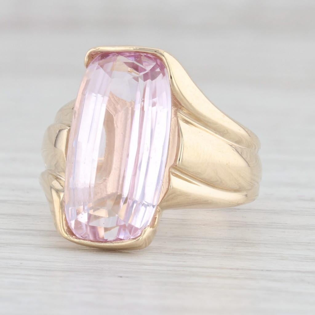 Gem: Natural Kunzite - 8.75 Carats (8.8 x 18 mm), Elongated Cushion Cut, Pink Color
Metal: 14k Yellow Gold
Weight: 11.4 Grams 
Stamps: 14k
Face Height: 18.4 mm 
Rise Above Finger: 8.1 mm

This ring is a size 5 3/4. Please contact for sizing options.