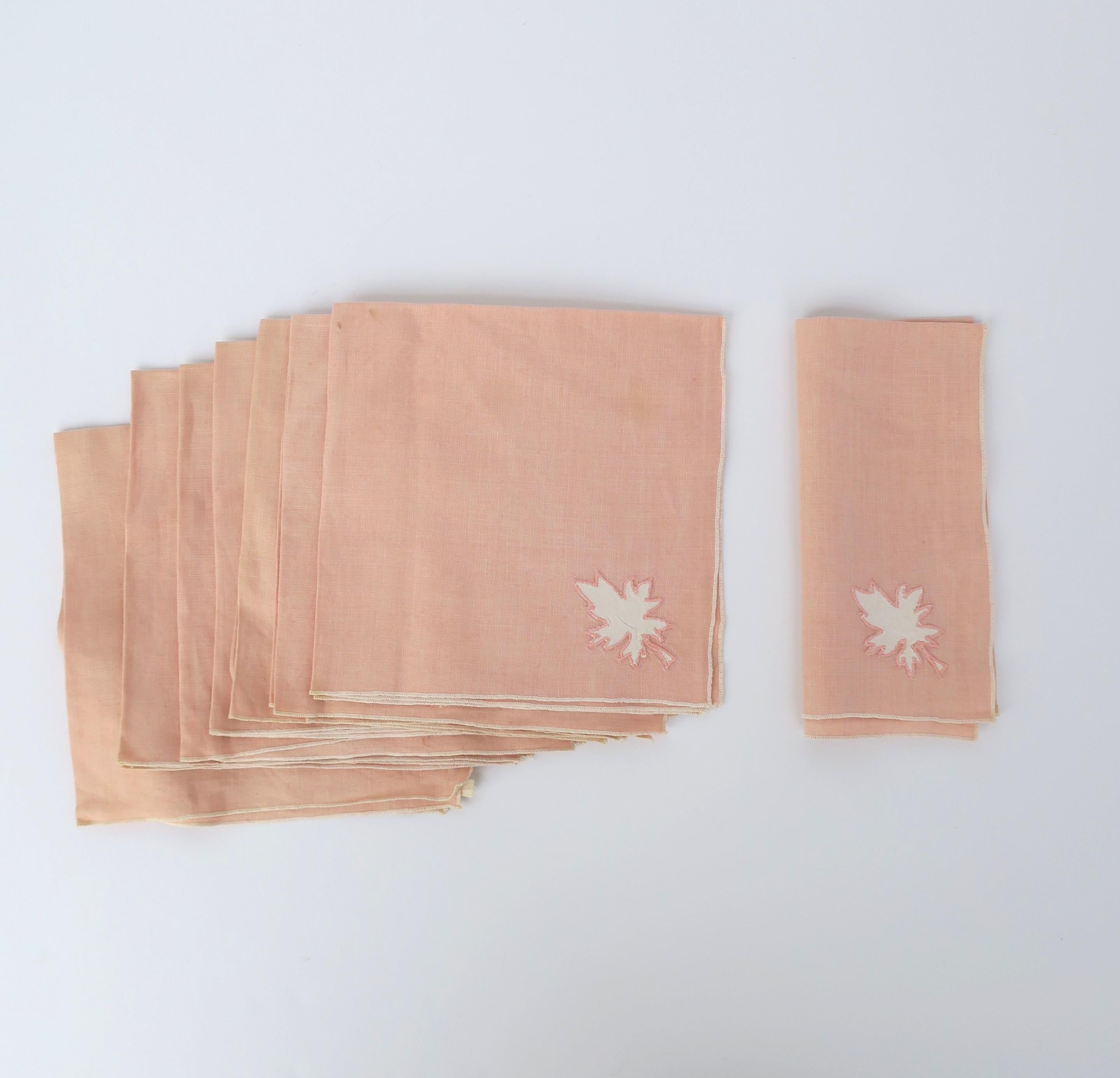 A beautiful set of eight (8) fine pink linen napkins with white leaf detail, circa 20th century. A great set for indoor or outdoor dining including picnic, patio, pool, garden, dining room, etc., breakfast, lunch, dinner. A great addition to any