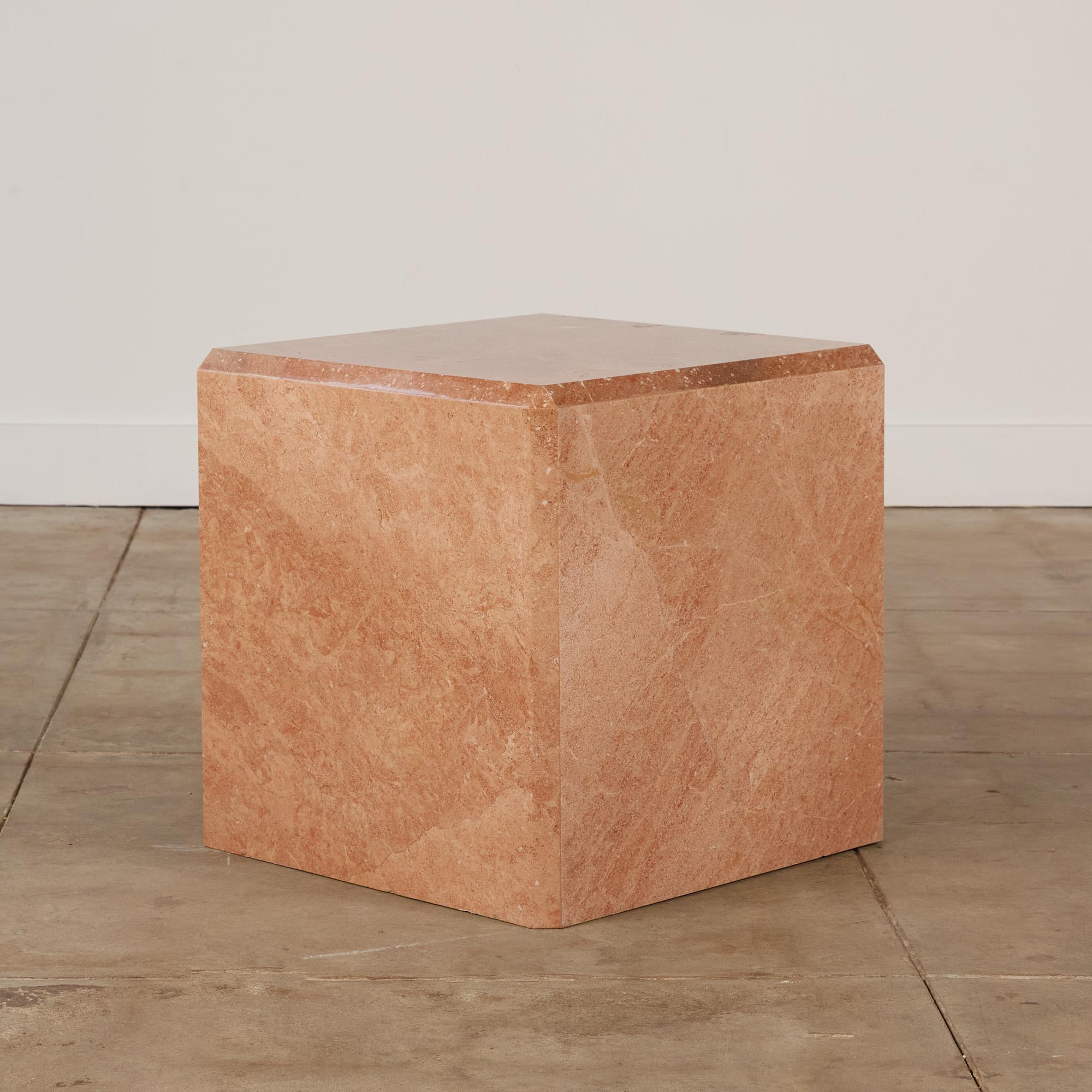 Cube side table in a beautiful pink marble in the style of Angelo Mangiarotti. This timeless stone table can be a sculptural piece of art or it can beautifully display any decorative object that rests upon it. It also serves as a very functional