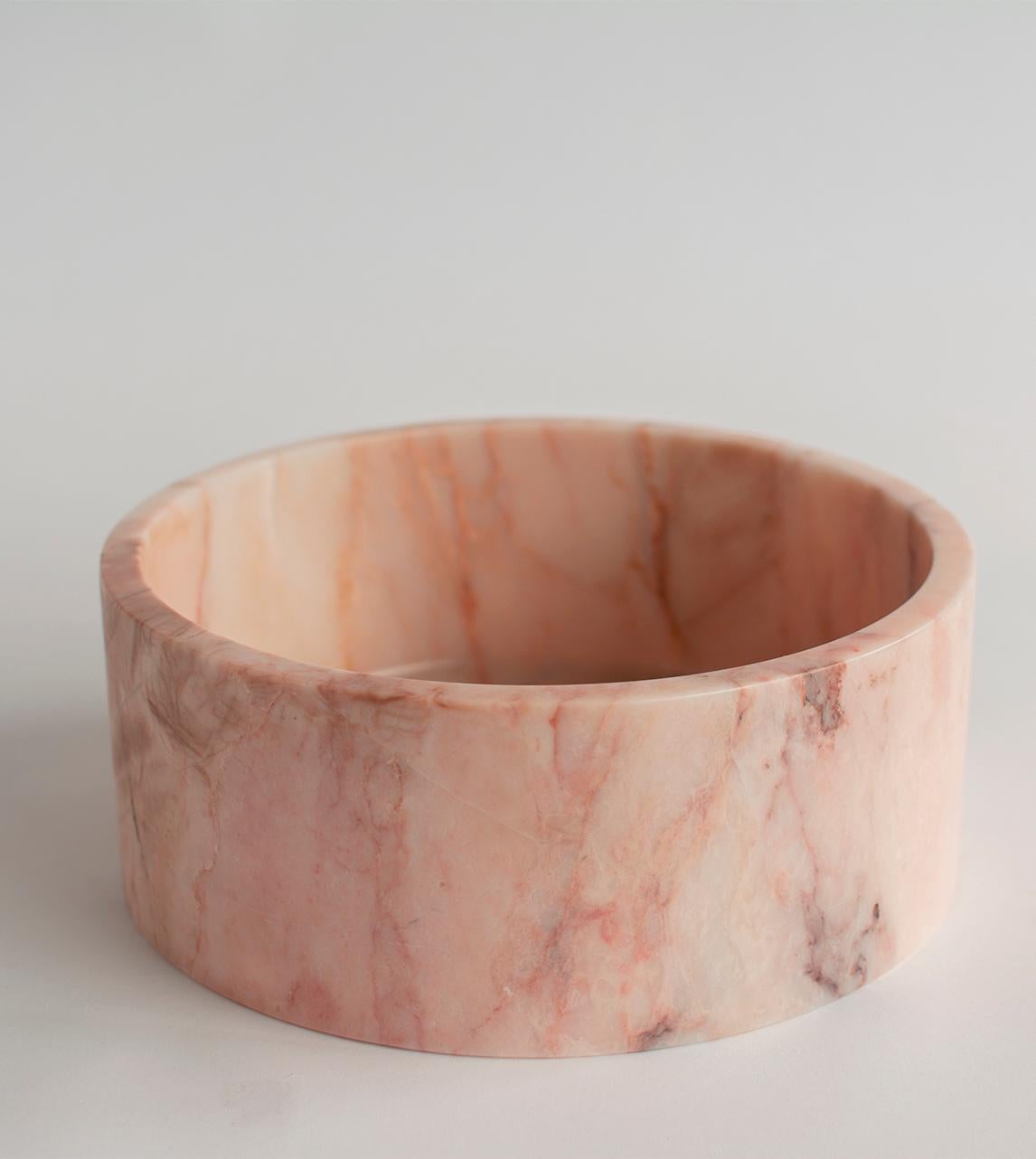 This substantial pink marble bowl is beautifully handcrafted from a single piece of genuine Turkish Black Marble and honed for a silky mat finish. 

There may be natural variations that are not product flaws, they make your design truly