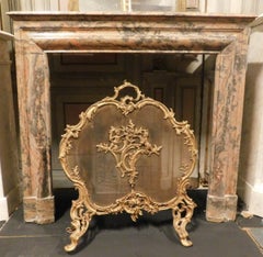 Pink marble fireplace, simple geometric shape, Italy