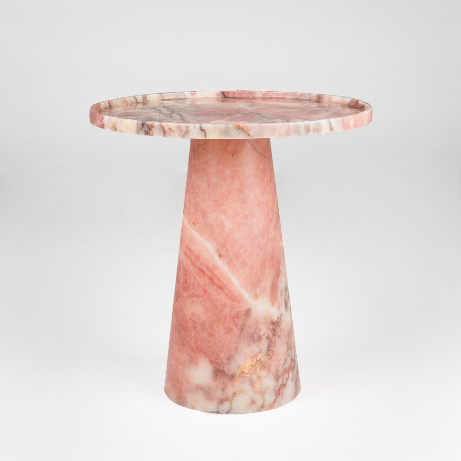 Pink Marble Pedestal Side Table made from marble with lilac purple veins. 

Stunning, aesthetic, timeless are words that can be used to describe this elegant and modern side table from Kiwano. Expertly crafted and finished by hand, our pink marble