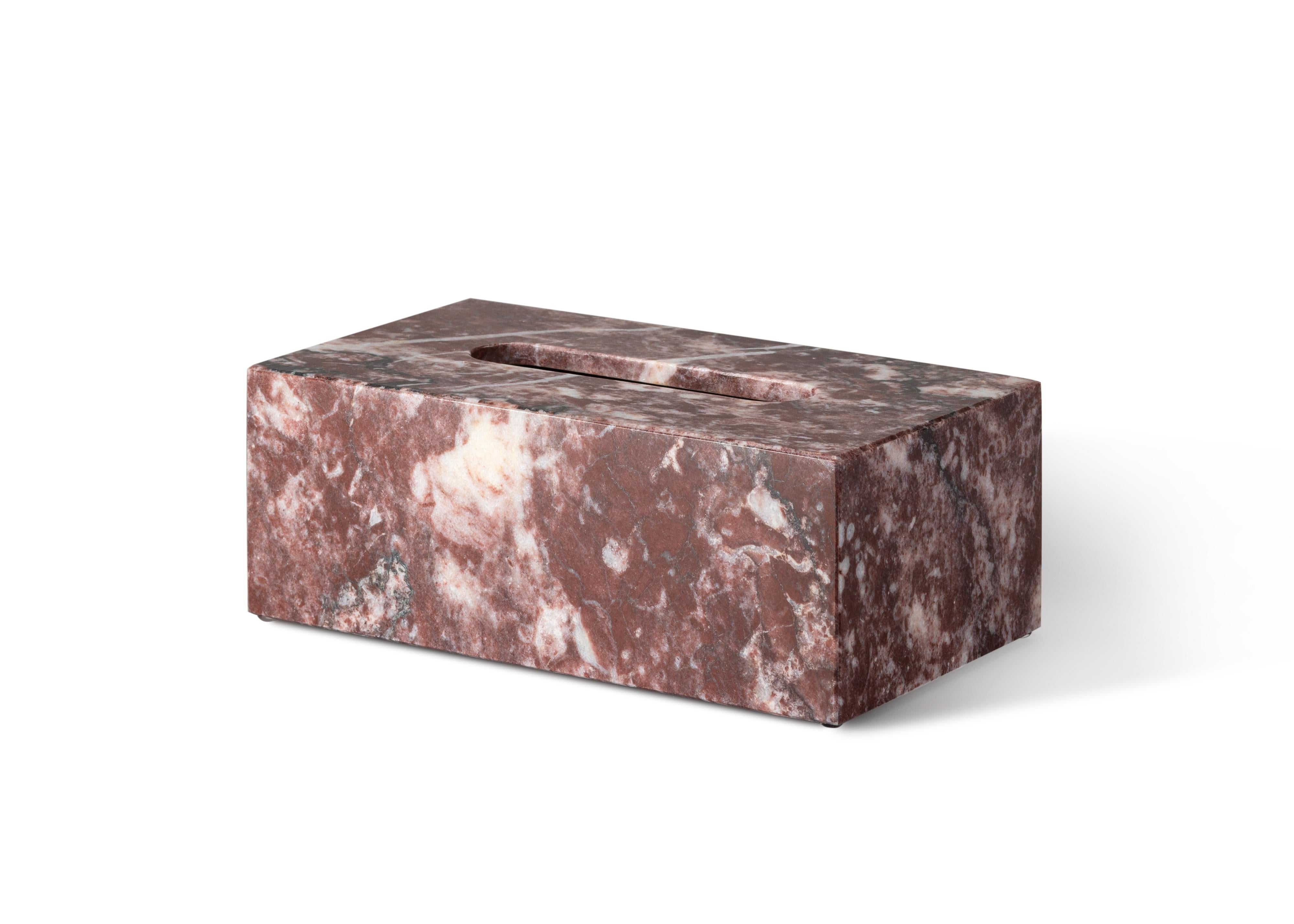 Crafted entirely by hand, this marble tissue box cover is a fusion of form and function, seamlessly blending into any space while adding sophistication and elegance. Clean, minimalist lines highlight the natural veining of the marble, making each