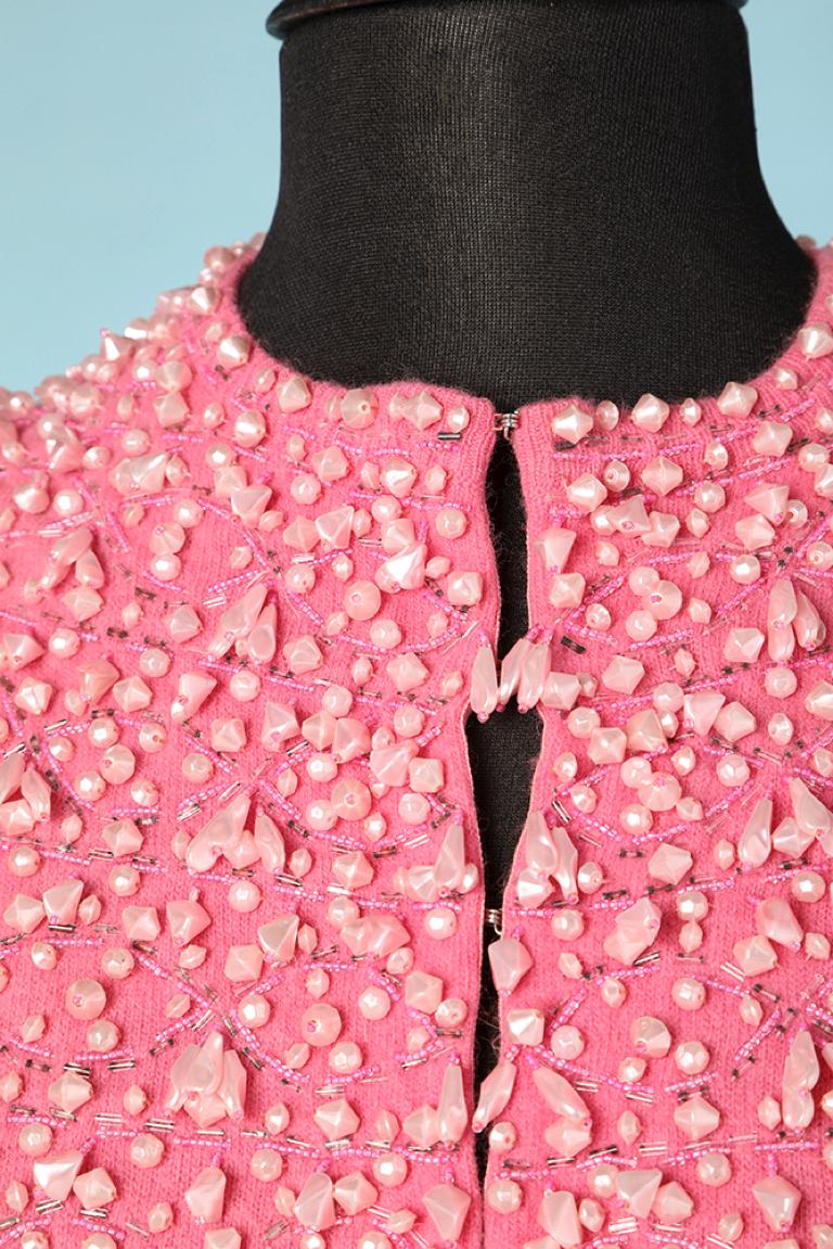 Pink mohair cardigan with beaded work. Silk lining.
SIZE 38 (M) 