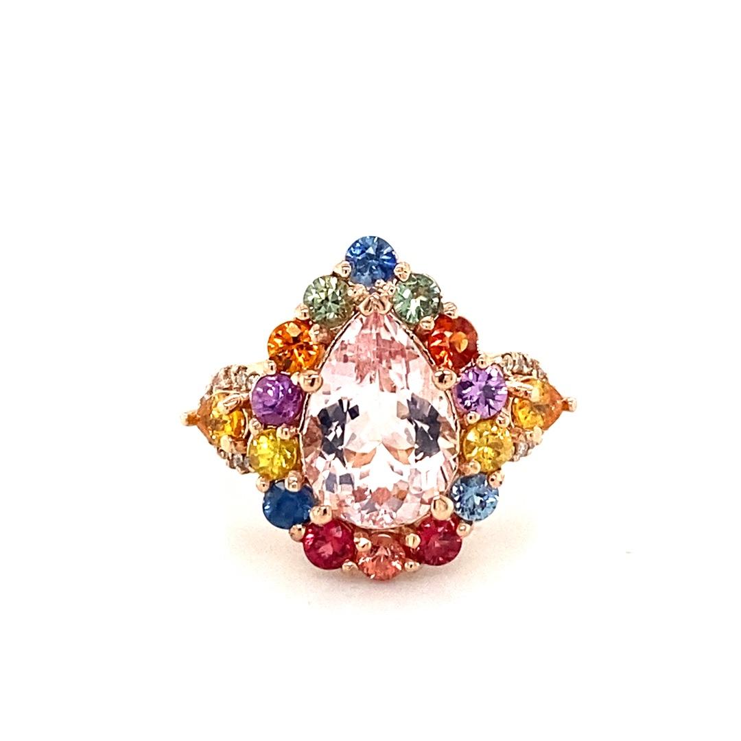 5.55 Carat Pink Morganite, Diamond and Multicolored Sapphire Cocktail Ring in 14K Rose Gold

A definite showstopper and a great alternative to a Pink Diamond!!

Item Specs:

Pink Morganite (Pear Cut) is 3.00 carats
26 Diamonds (Round Brilliant Cut)