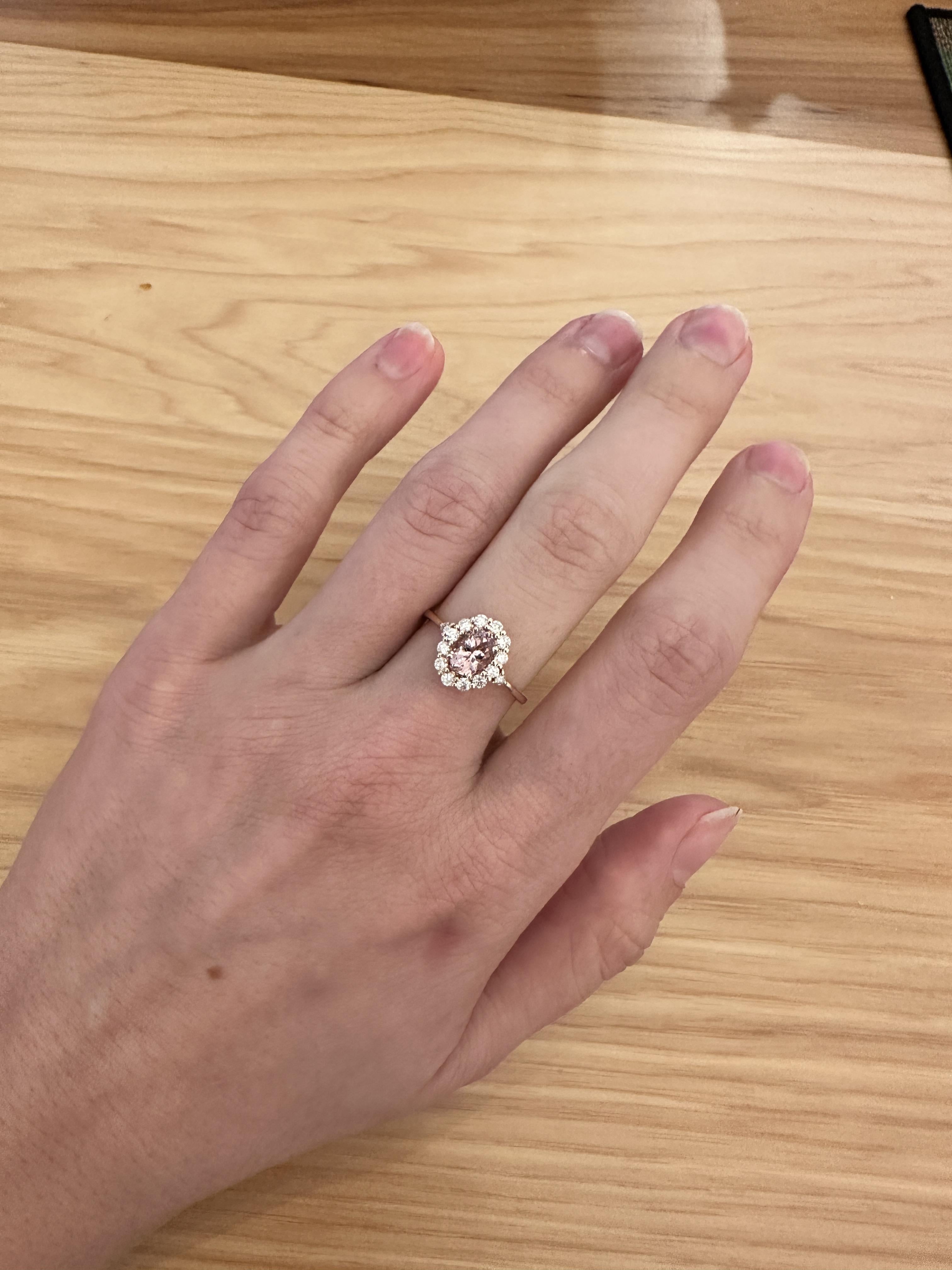 This beautiful ring features a pretty 0.67 carat pink morganite gemstone with a halo of natural earth-mined diamonds and a diamond-studded shank, all set in solid 14k rose gold . A timeless ring design perfect for an eye-catching engagement or