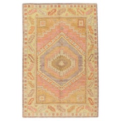 Alfombra Oushak turca de lana tejida a mano multicolor rosa 4' x 6'