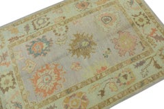 Alfombra Oushak turca de lana tejida a mano multicolor rosa 4'1" x 6'2