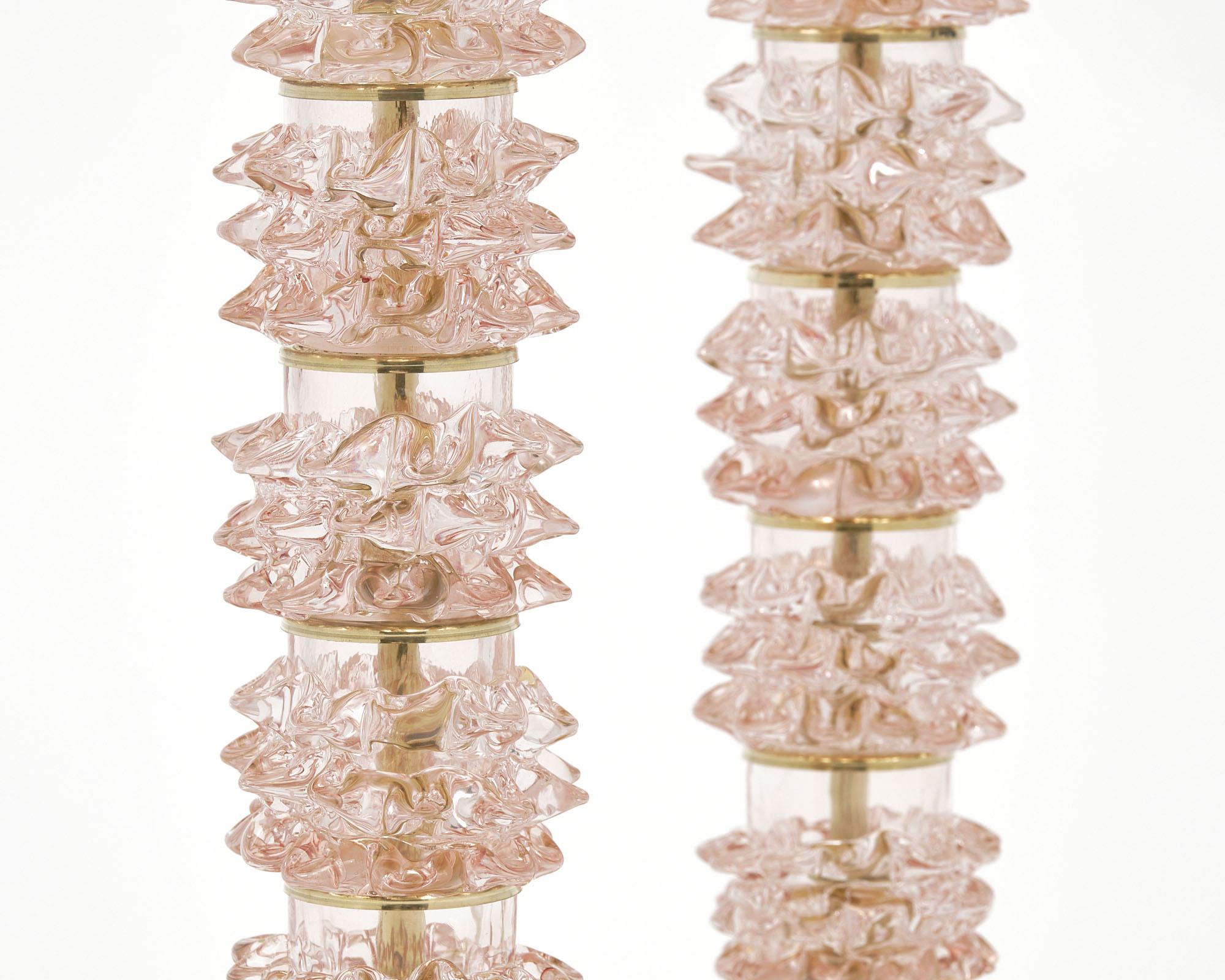 Pair of Italian lamps from the studios of Barovier on the island of Murano. Each lamp features five pink “Rostrate” glass components with a brass base and stem.