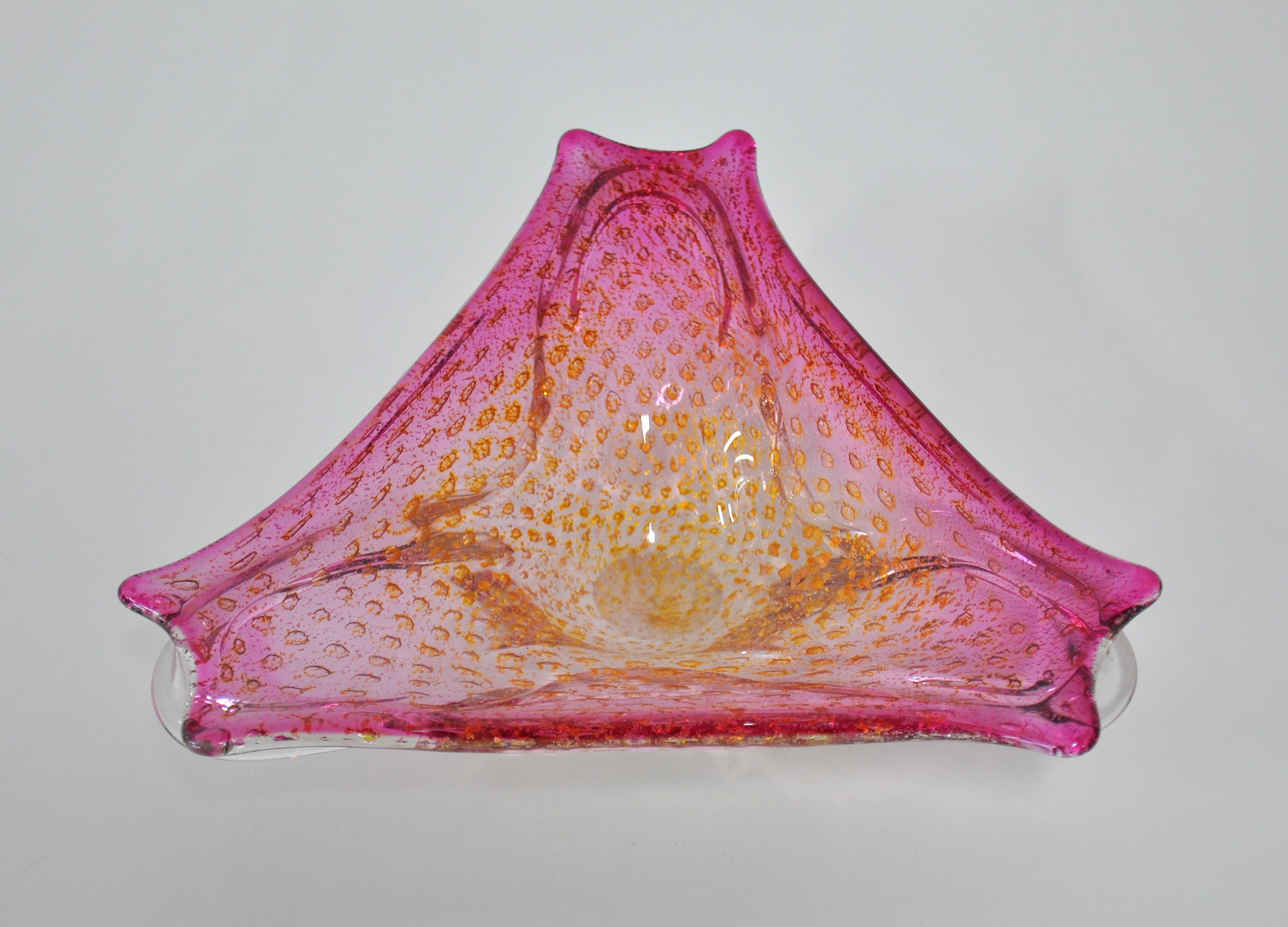 Vintage Mid-Century Modern Venetian hand blown glass bowl or ashtray with organic floral form. It features pink and clear glass, controlled bubble design, gold aventurine flecks, and pinched rims with flared sides. A great example of Italian