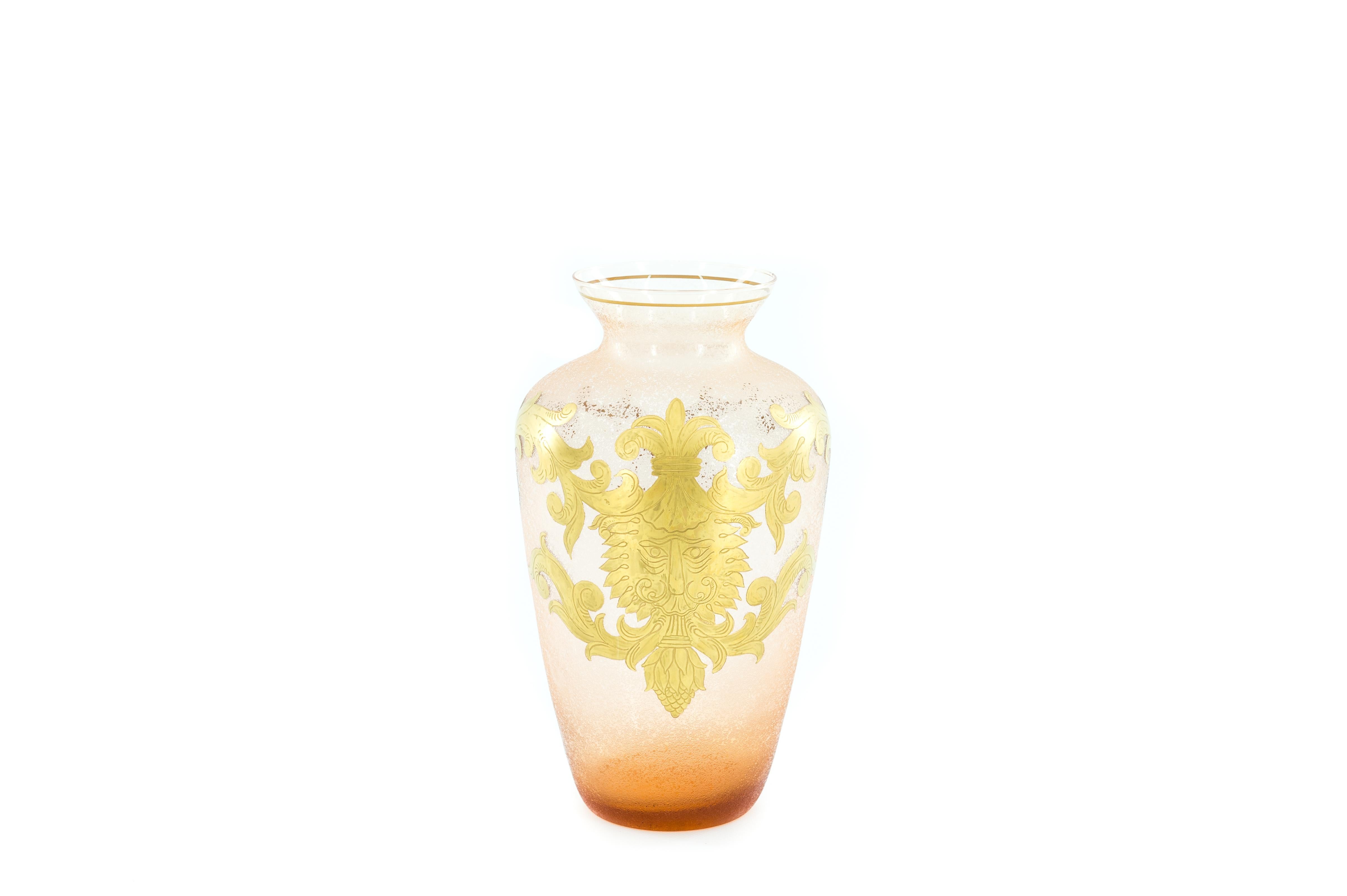 Presented here is an exquisite Pink Murano Glass Vase with a Gold Hand-Painted Decorative Motif from the 1960s, embodying the quintessential elegance of Mid-Century Modern design. This stunning piece, originating from the renowned glass-making