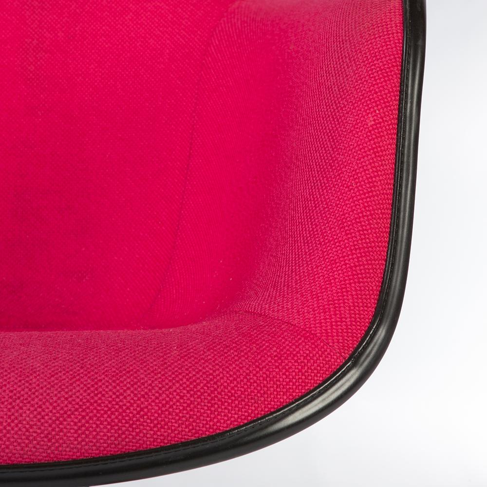 American Pink on Black Herman Miller Original Eames Upholstered Rocking Arm Shell Chair For Sale