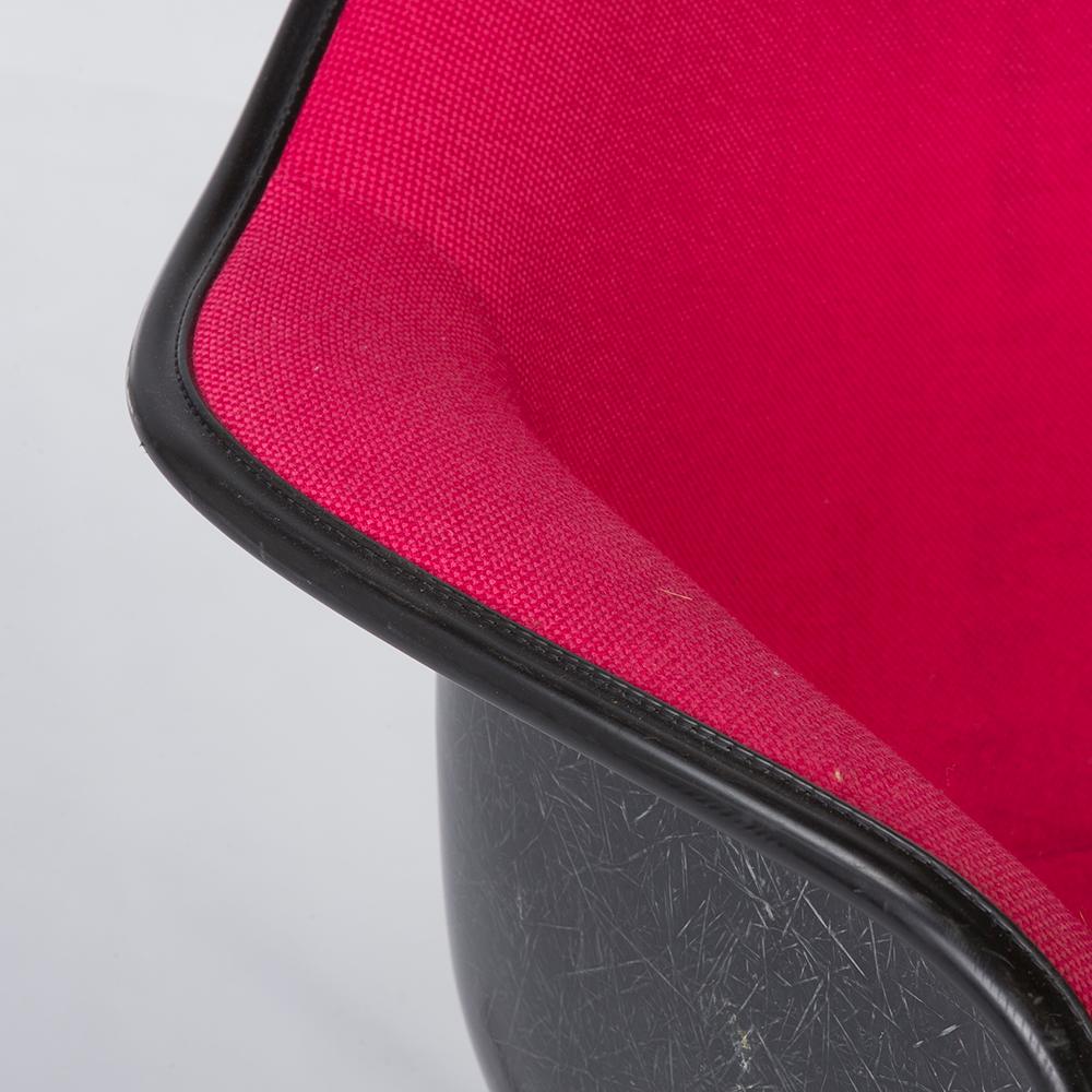 Molded Pink on Black Herman Miller Original Eames Upholstered Rocking Arm Shell Chair For Sale