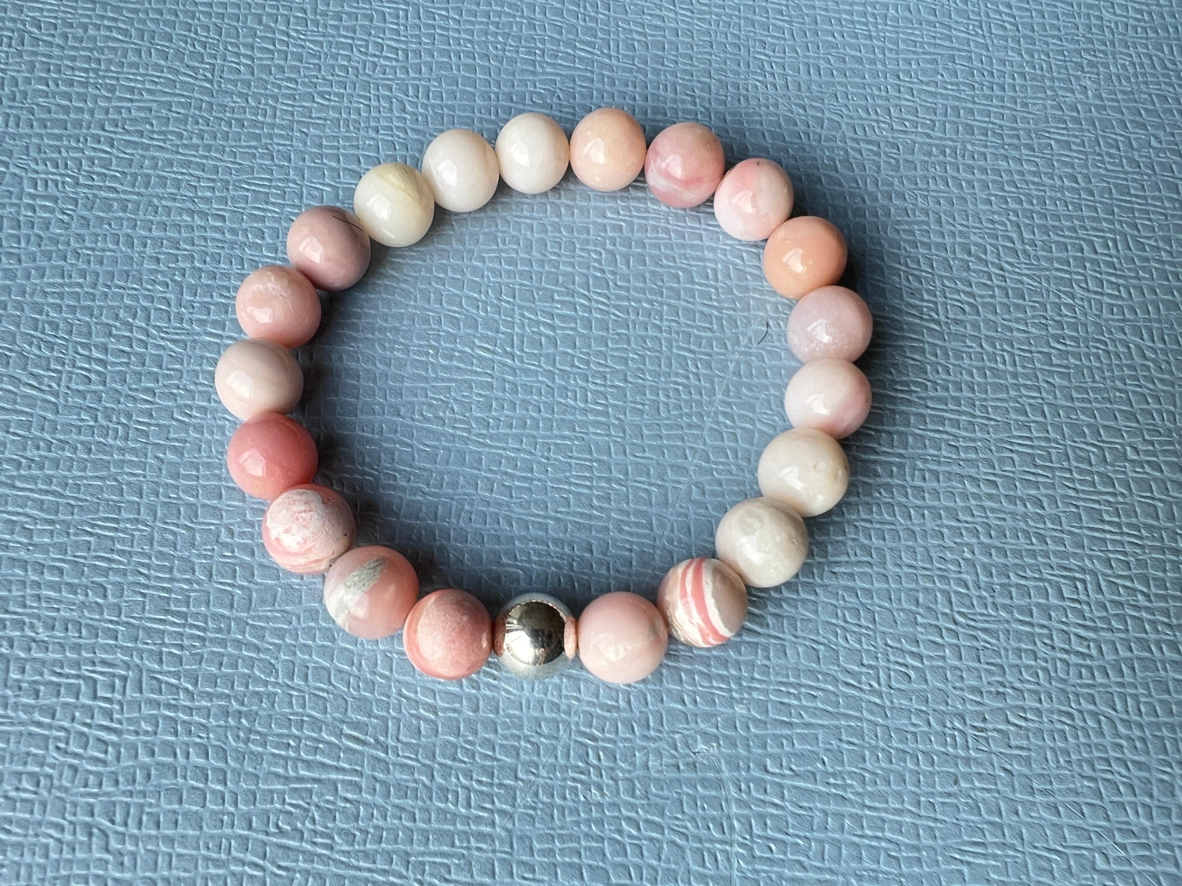 Pink Opal Bead Bracelet with Silver Accent, Elastic, Heart Chakra, Small/Medium, Made in Los Angeles

Description:
Elastic bracelet made with soft pink opal beads and finished with a silver accent bead, designed for heart chakra support and