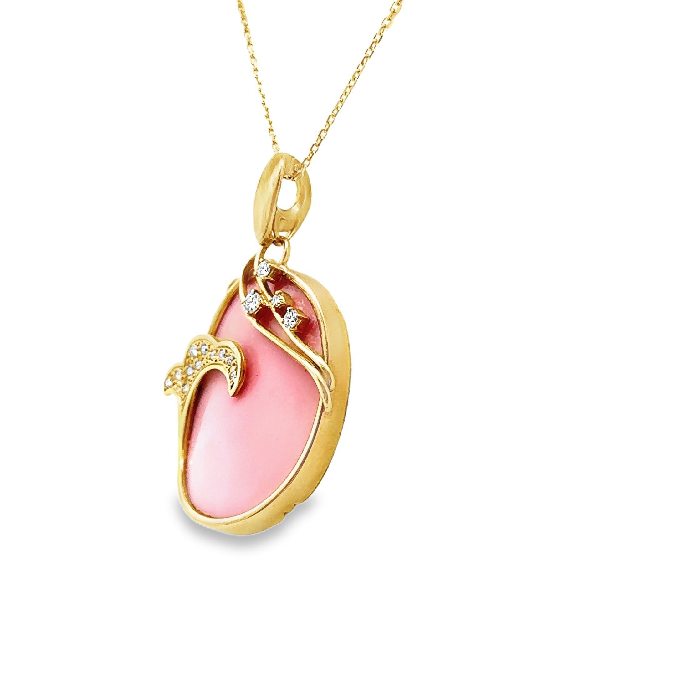 This elegant pendant necklace features a captivating 29.85 carat oval shape opal, exuding a soft pink hue. The pendant is meticulously crafted in 18k yellow gold, with delicate curves and swirls enhancing its design. Accentuating the opal are 0.30