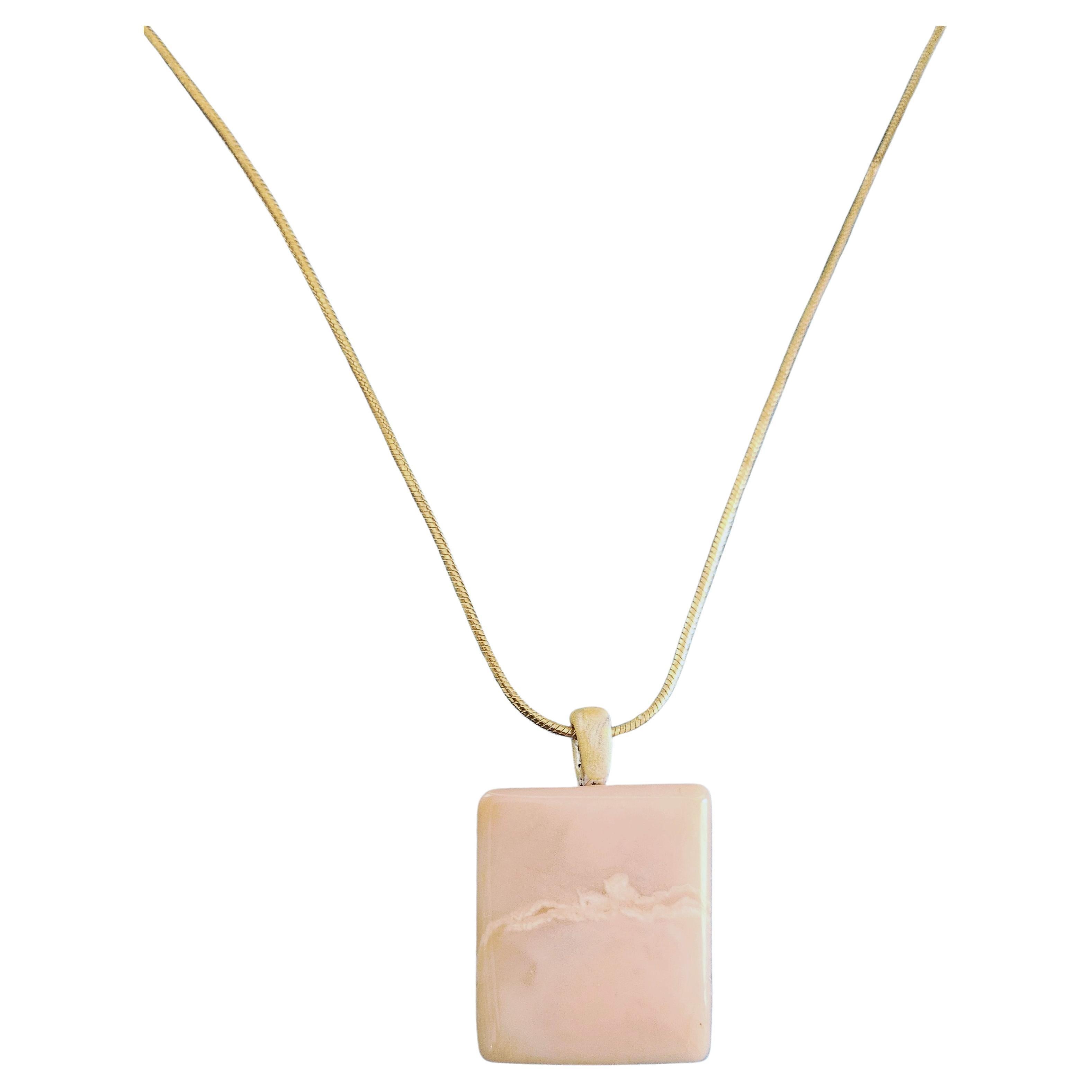 Pink Opal Pendant on Sterling Silver Vermeil Necklace Chain, Vintage, Stamped 
The polished stone has a pretty, naturally occurfring pattern that looks like a cloud line or a surf line. The stone is light pink and we are told it's a pink opal. The