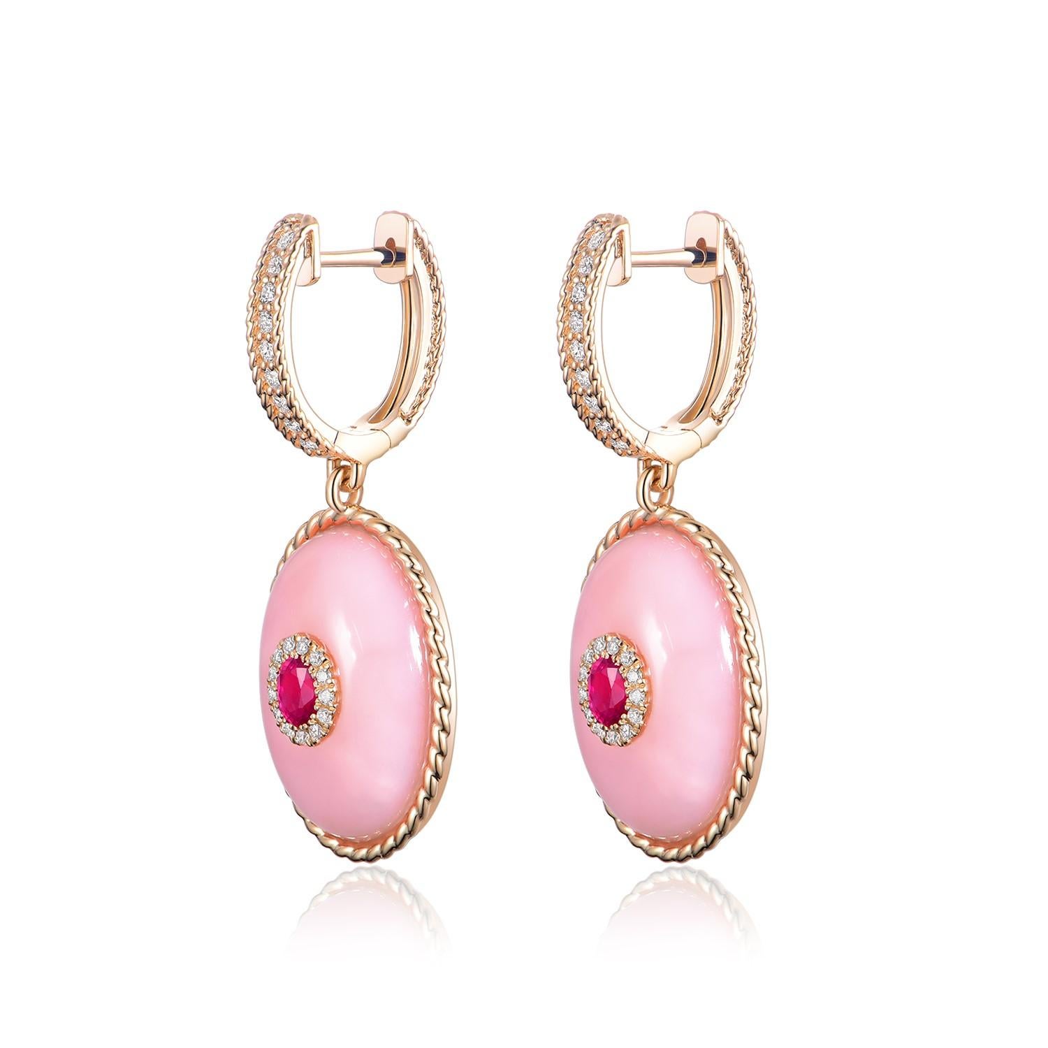 Embrace the allure of vibrancy and luxury with our Pink Opal Ruby Dangle Earrings set in 14 Karat Yellow Gold. These earrings boast an enchanting centerpiece of two oval-shaped Pink Opals, weighing an impressive 16.644 carats, each nestled in