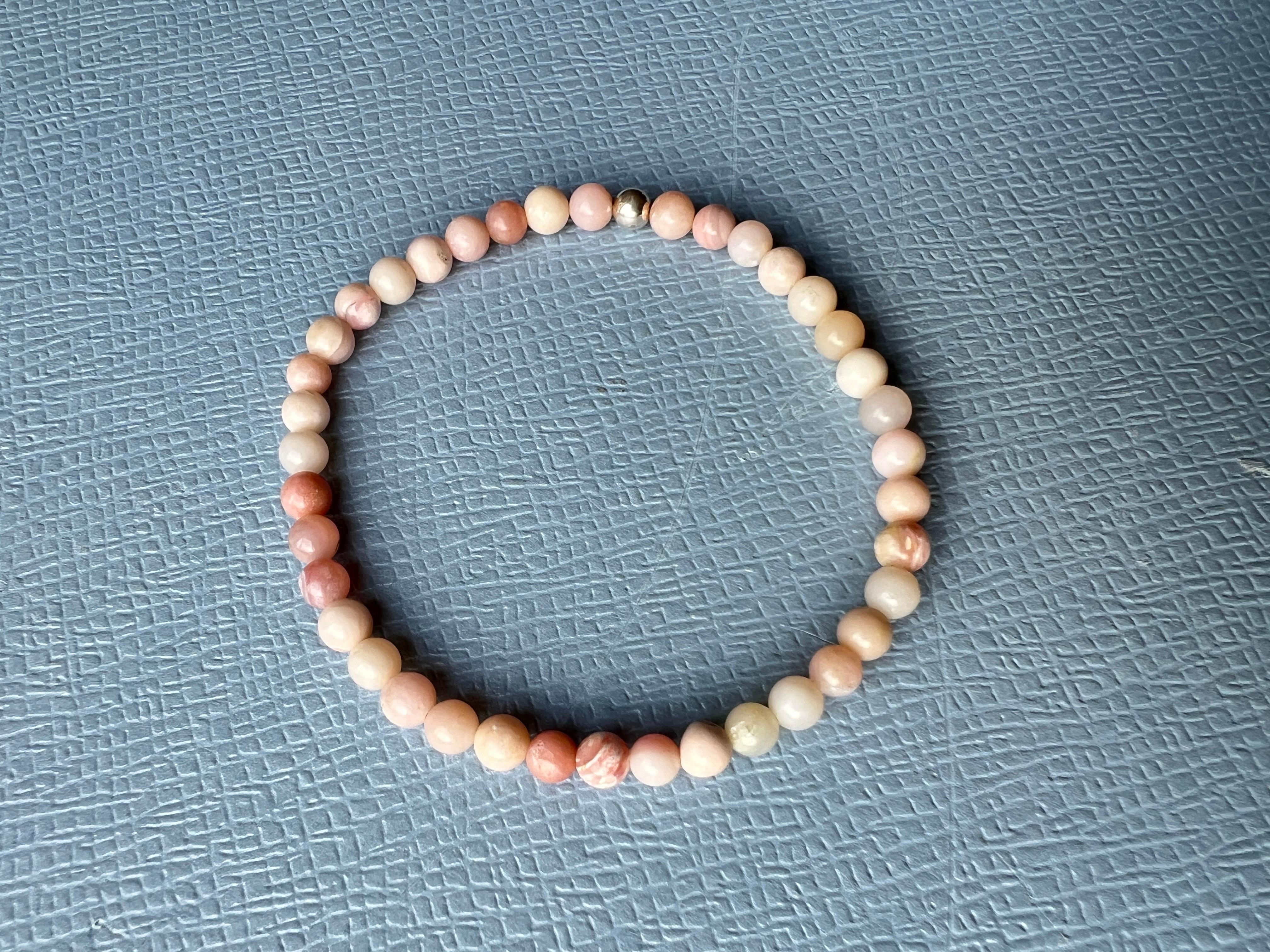 Pink Opal Bead Bracelet, Elastic, Heart Chakra Support, Small/Medium, Made in Los Angeles

Description:
Elastic bead bracelet made from soft pink opal, designed for heart chakra support and emotional balance. Sized for small to medium wrists, this