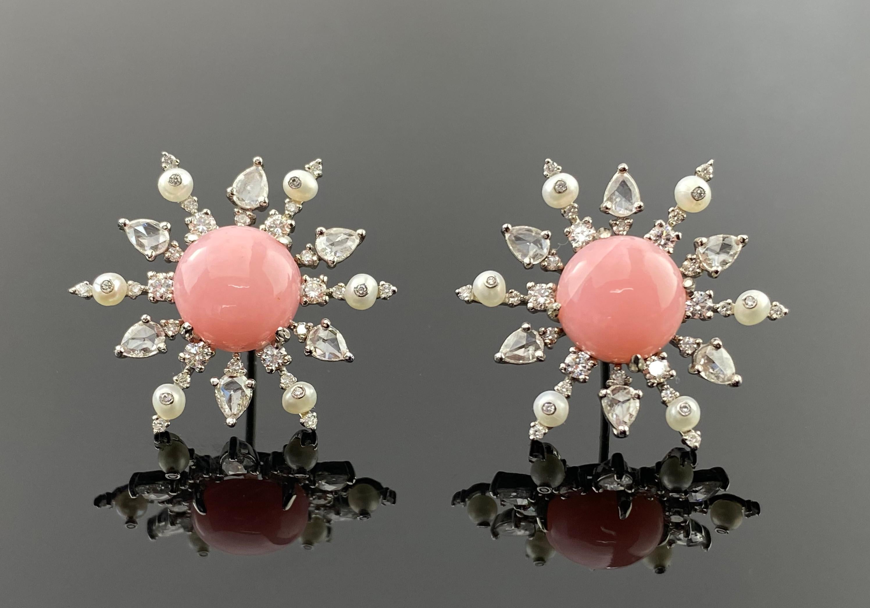 The soft, blush-hued Pink Opals exude a delicate charm, while the pearls add a touch of timeless sophistication. Brilliant and Rose cut White Diamonds gracefully frame the ensemble, enhancing the overall allure and making these earrings a versatile