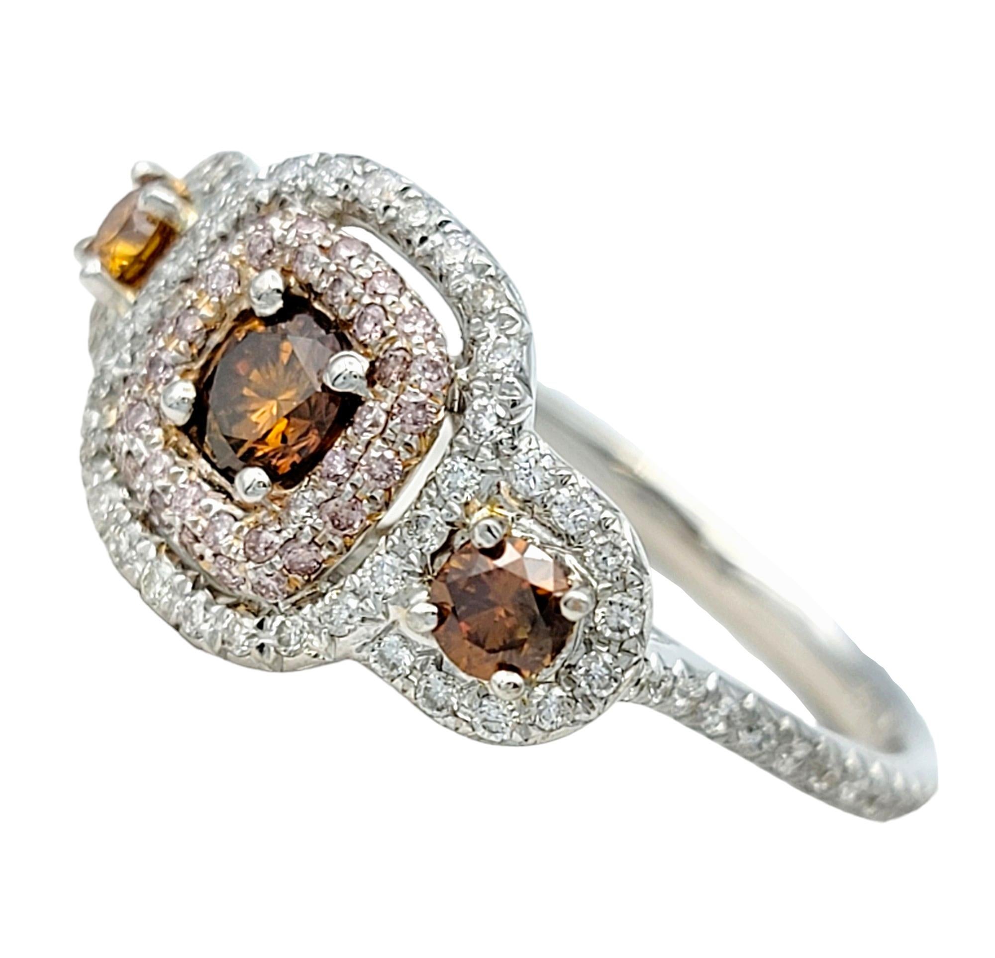 Contemporary Pink, Orange and White Diamond 3-Stone Halo Style Ring in 18 Karat White Gold For Sale