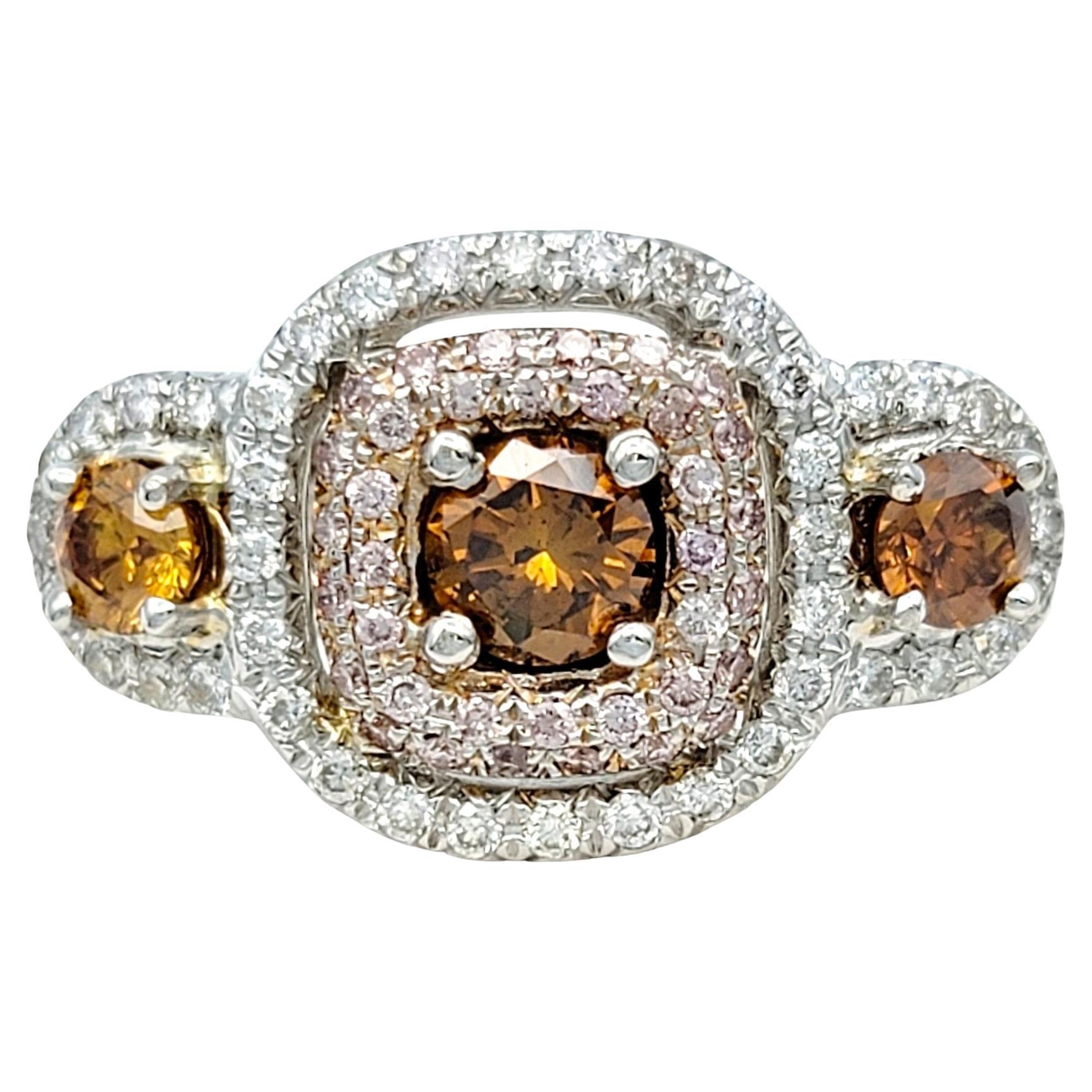 Pink, Orange and White Diamond 3-Stone Halo Style Ring in 18 Karat White Gold For Sale