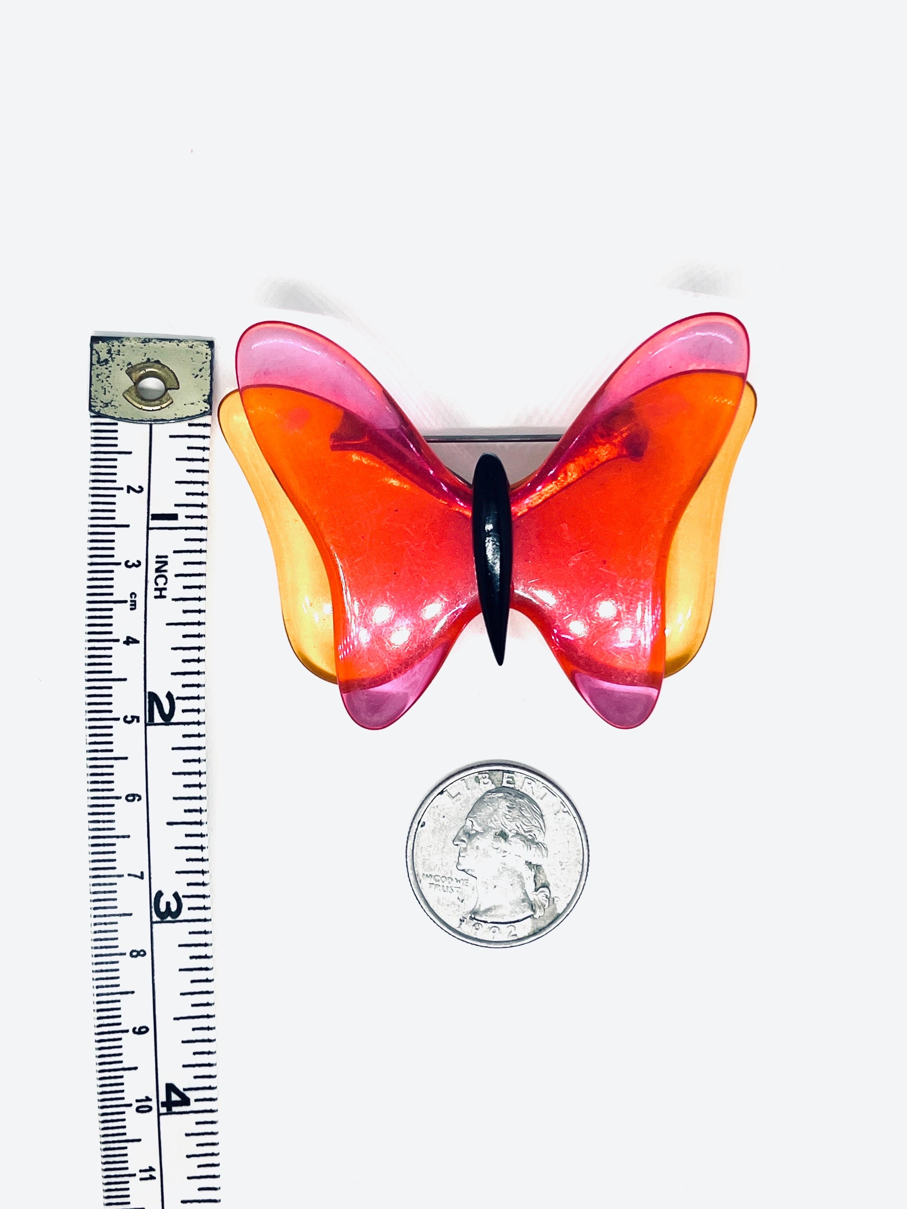 Women's or Men's Pink Orange Twiggy-Style Mod Transparent Lucite Butterfly Brooch c. 1960s For Sale