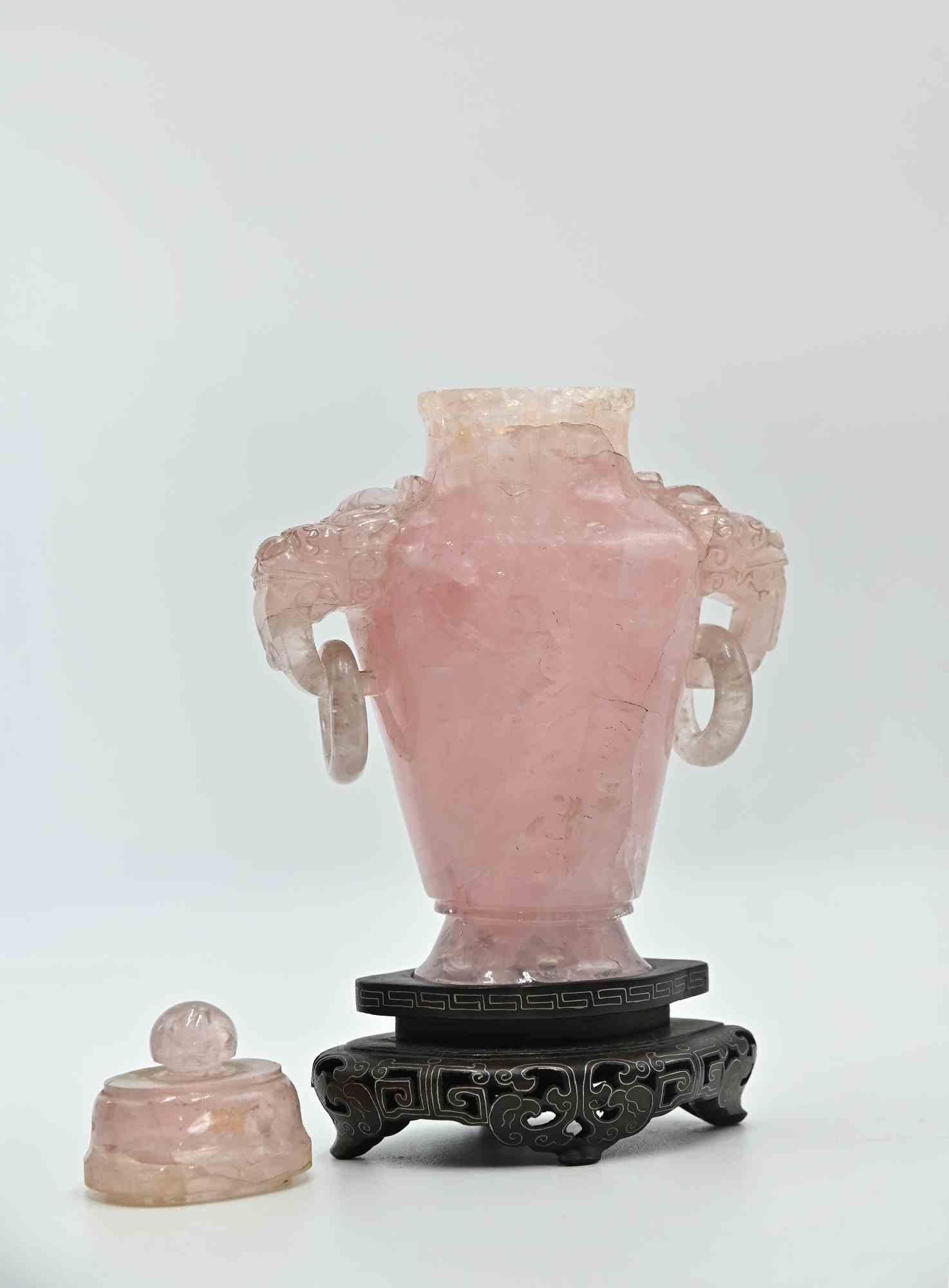 Pink Oriental Censer is an original design decorative object realized in the first half of 20th Century.

A beautiful pink quartz censer with a teak base.

Fair conditions (some cracks signs on side).

Includes original case.

Decor your home with