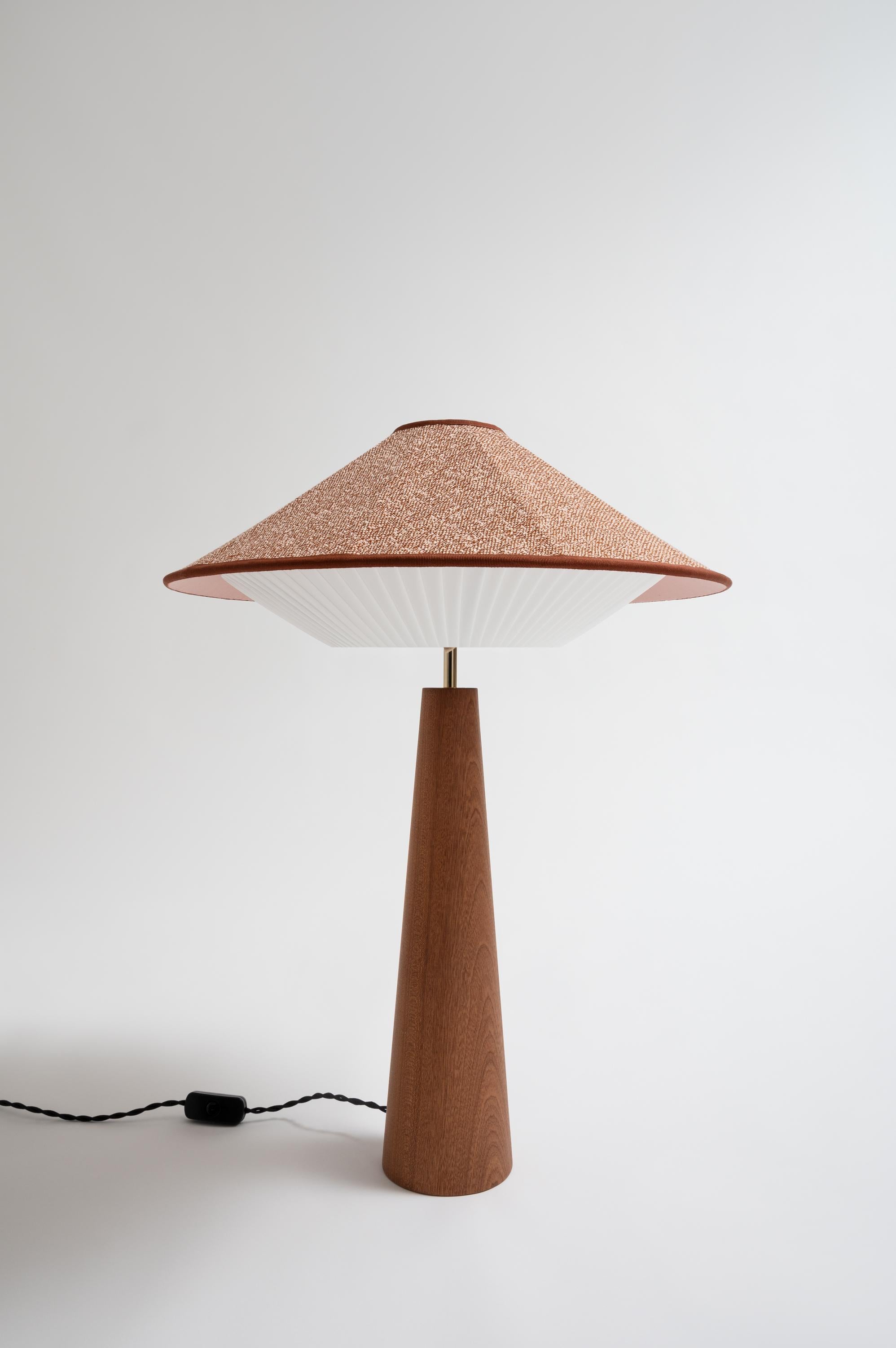 Pink Otto Table Lamp by Servomuto
Dimensions: D 50 x H 67 cm
Materials: Upper Lampshade: Rubelli / Dedar fabric. Lower Lampshade: Pleated pongé bends. Structure: Mahogany base and brass-plated iron details.
Weight: 3 Kg. 

Derived from the