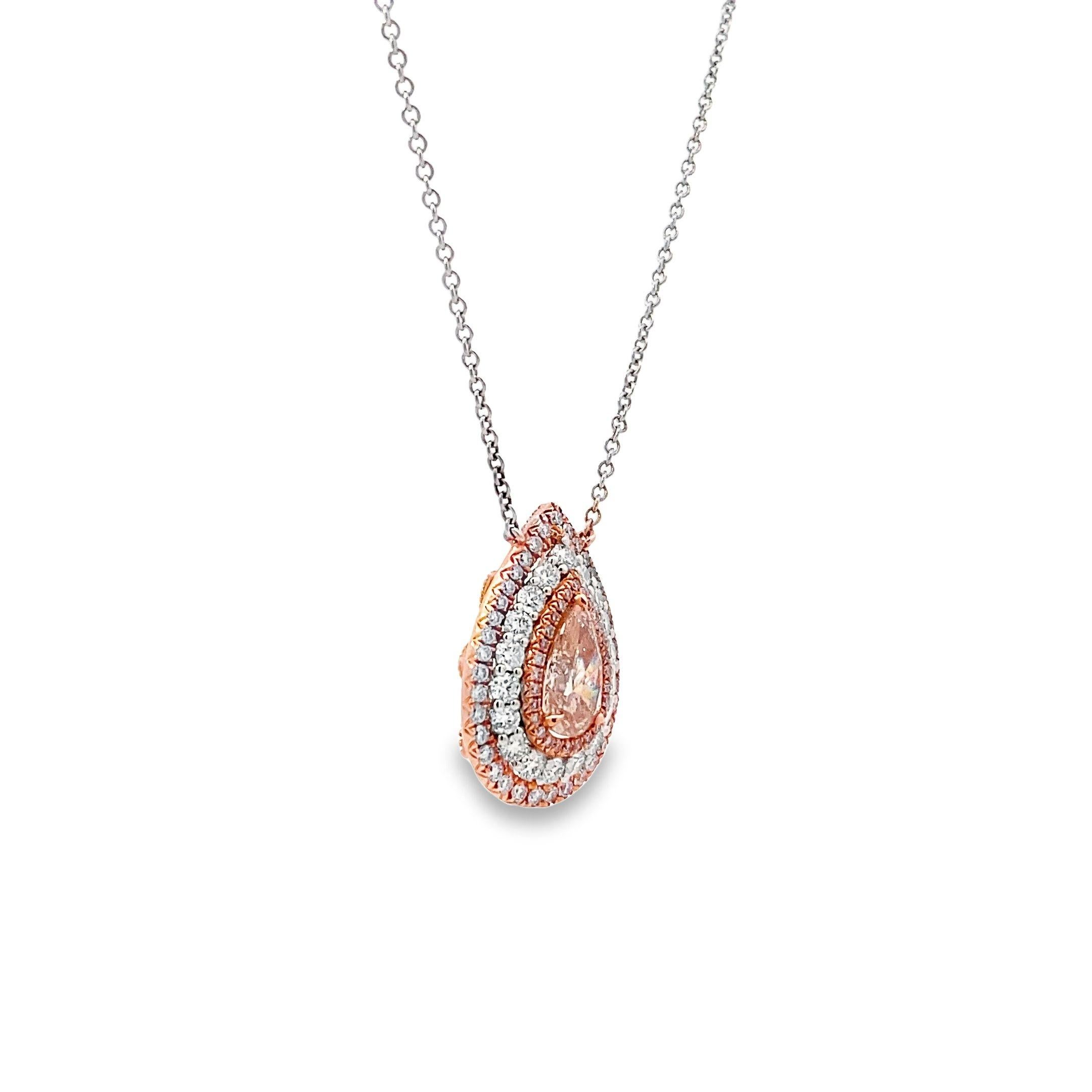 This exquisite 18k necklace exudes a perfect blend of classic elegance and modern sophistication. The piece showcases a dazzling array of gemstones, including a sparkling 0.54 carat white round diamond, a luxurious 0.92 carat pink pear-shape