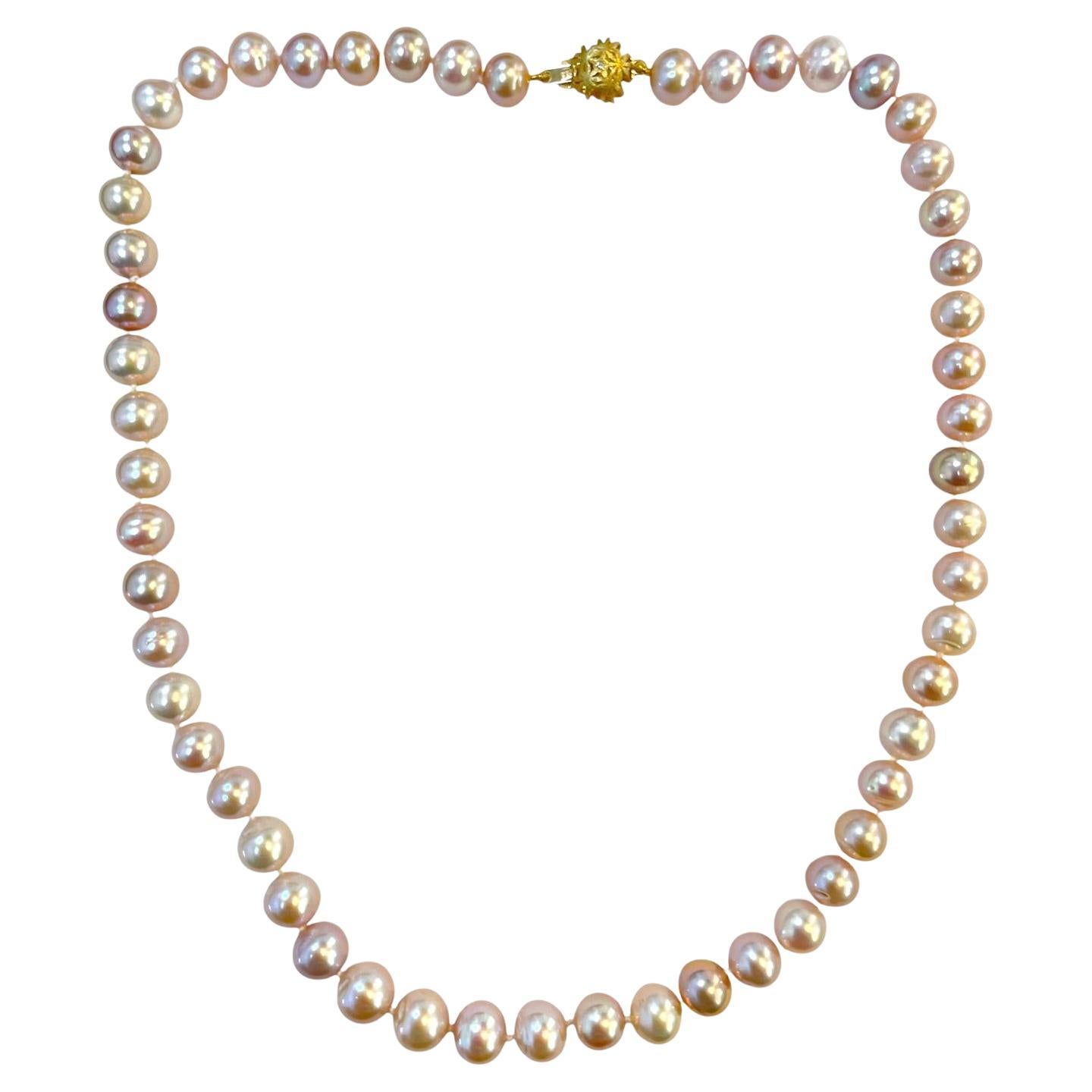 Collier de perles roses à un brin avec fermoir en or jaune 14k