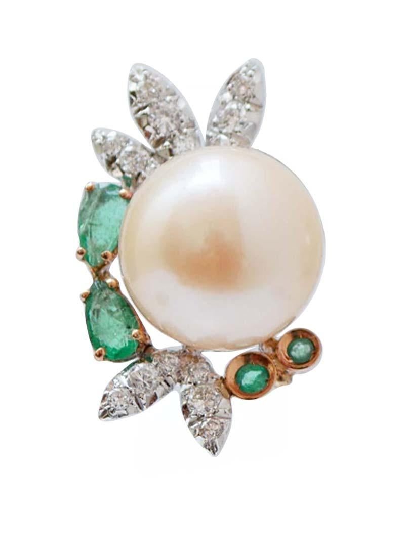 Fantastic earrings in 14 kt white gold structure mounted with diamonds and emeralds. In the central part, a pink pearl.
These earrings were totally handmade by Italian master goldsmiths and they are in perfect condditions.
Diamonds 0.62 ct
Emeralds