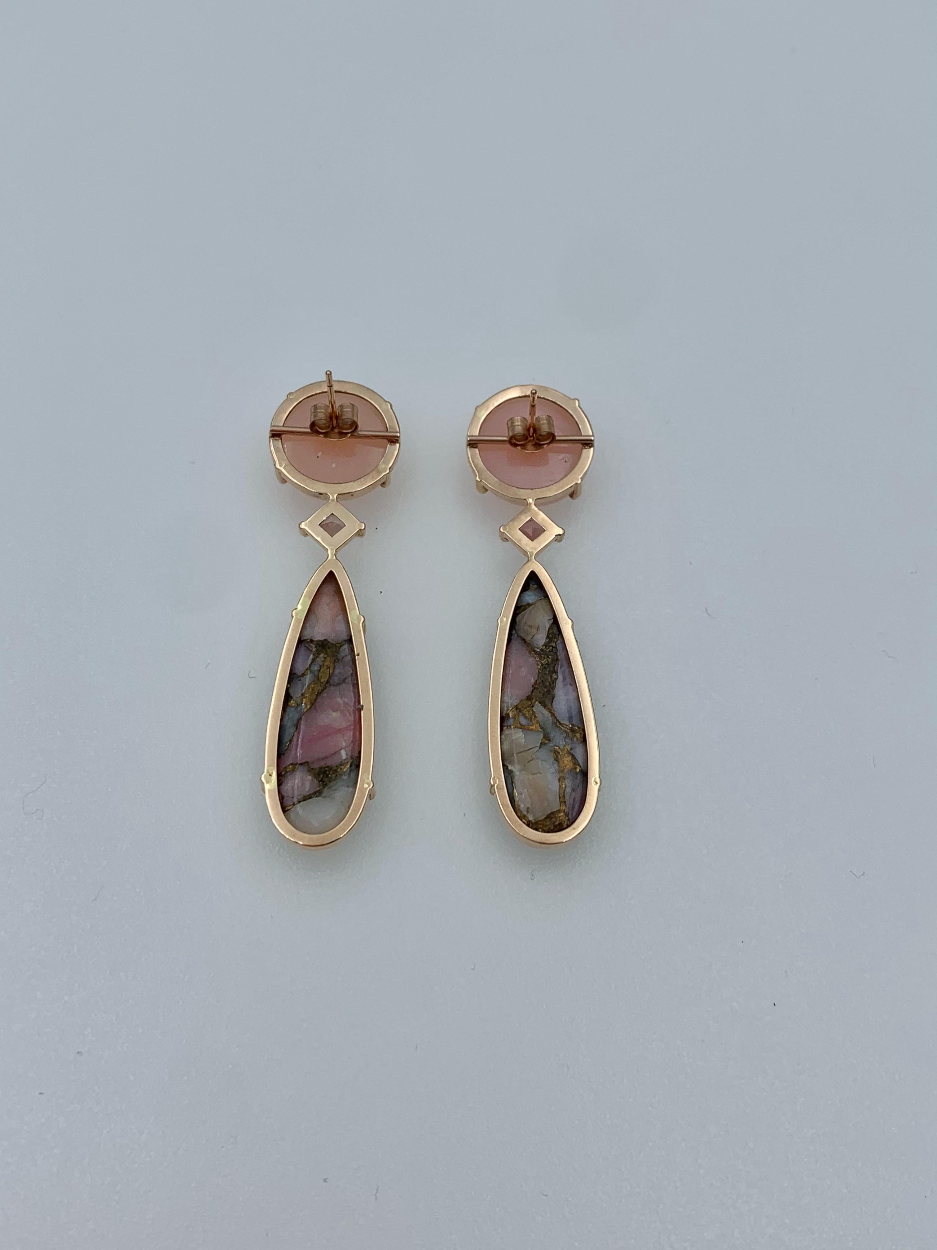 Handmade in 9 karat rose gold, these drop earrings have a Peruvian pink Opal cabochon, a princess cut Tourmaline and a long pear Copper Opal cabochon. Ideal for any party but can also spruce up your casual look. Though long, lightweight and easy to