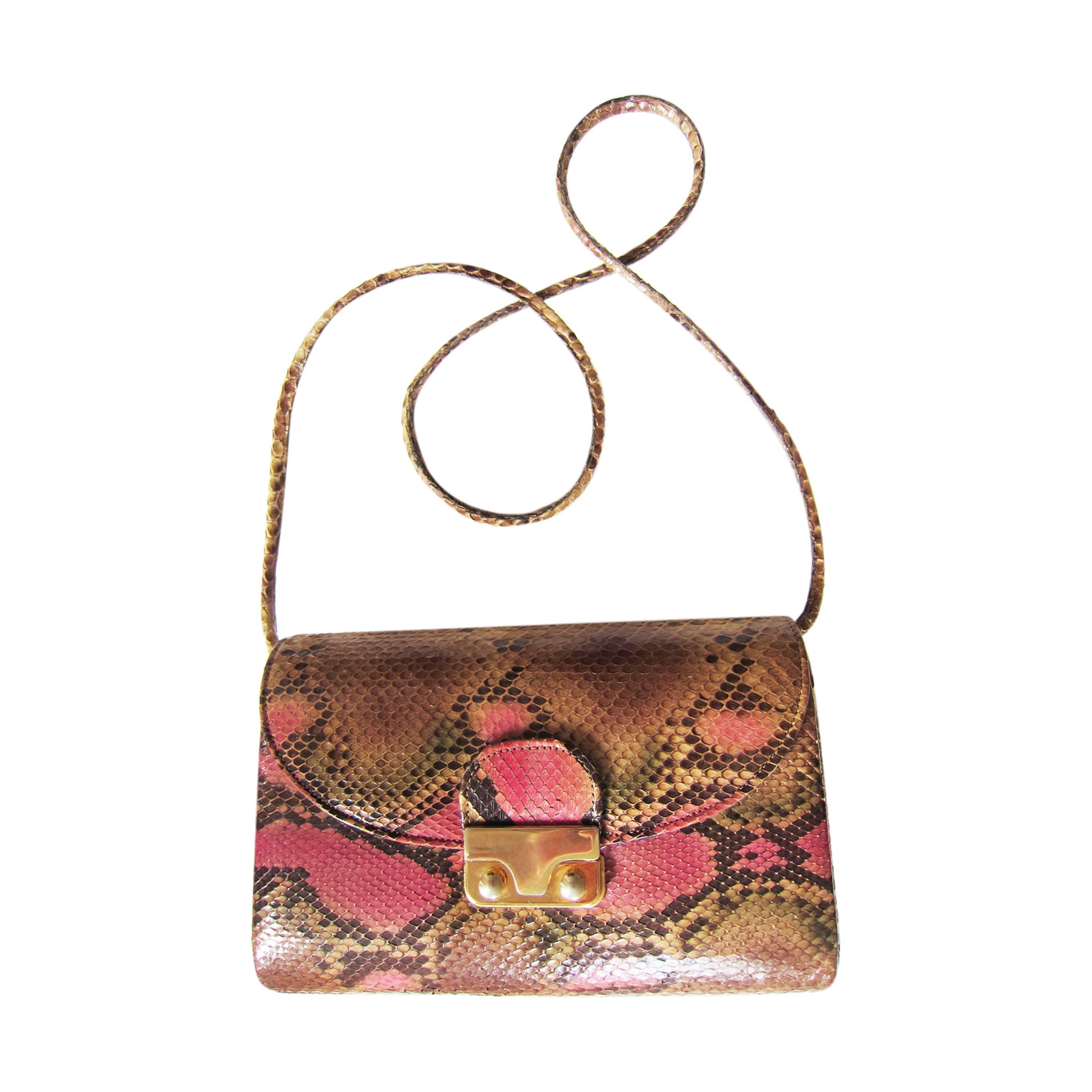 Vintage pink python shoulder clutch purse from circa 1970's.
This rare found no name purse has gold hardware closure and an zip pocket inside, in excellent condition.
Measurements : 
22 cm x 15 cm x 6.5 cm
Total length strap : 110 cm