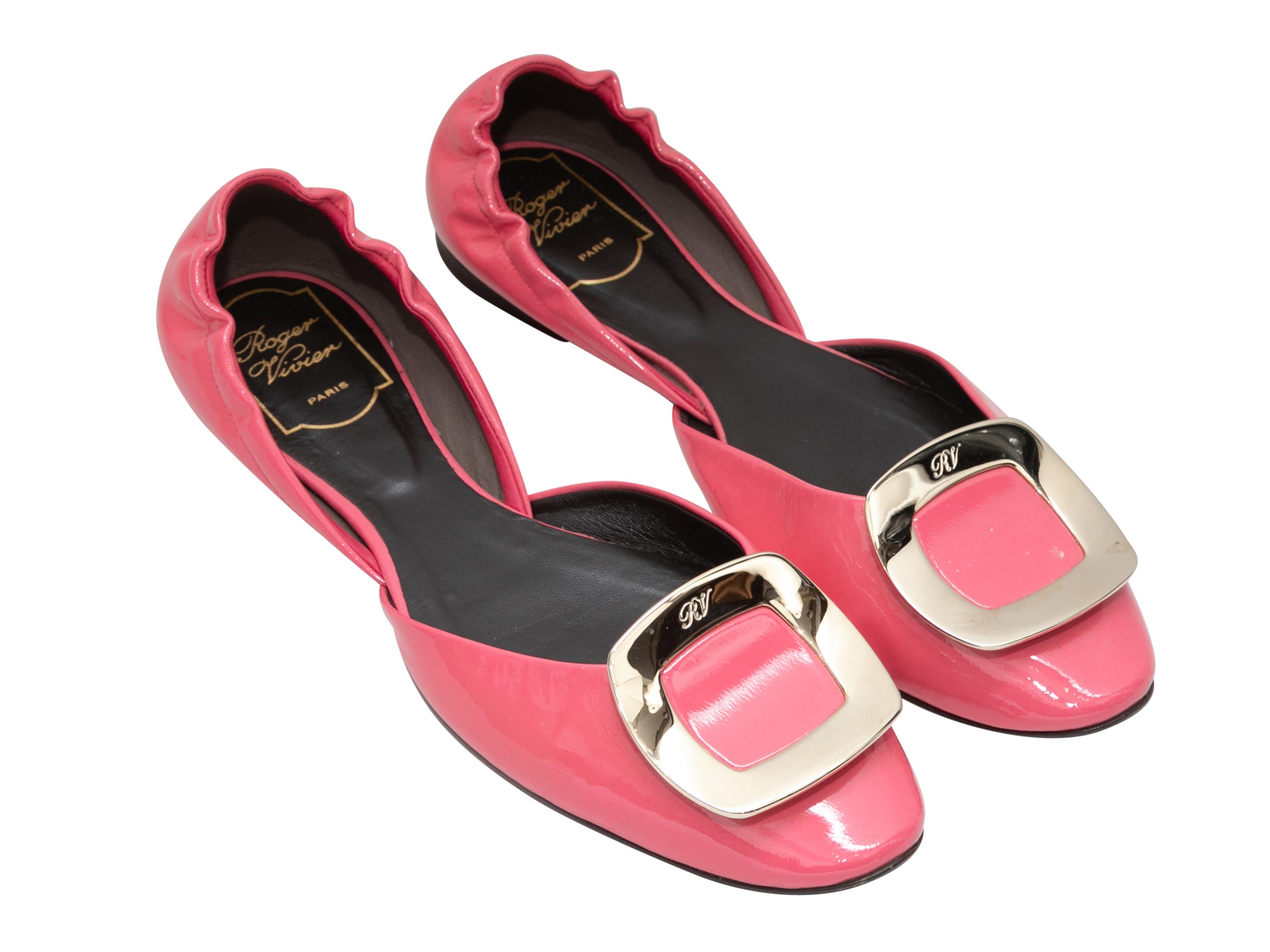 Pink patent leather d'Orsay ballet flats by Roger Vivier. Gold-tone buckle accents at tops.