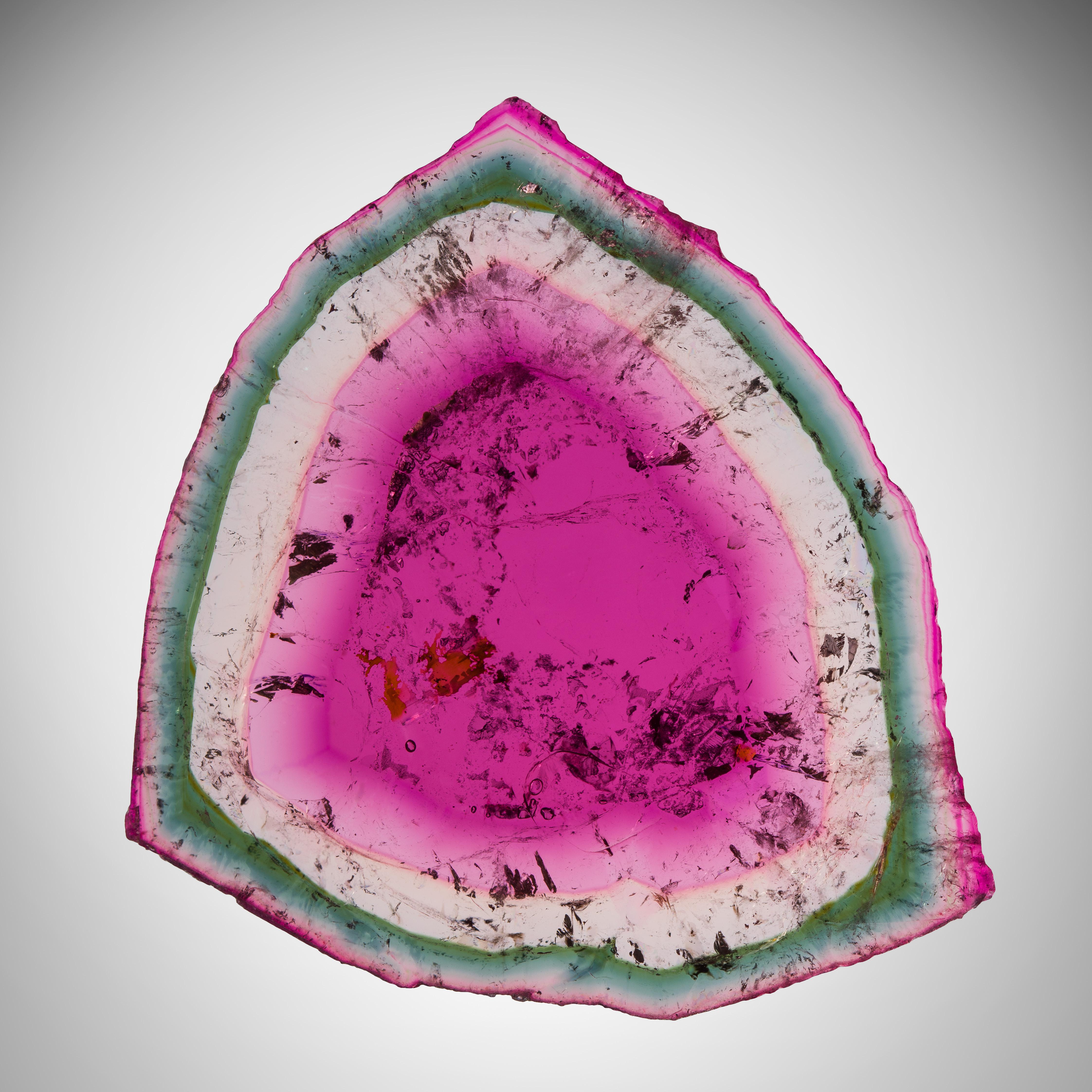 Tourmaline is loved in both the worlds of jewelry and mineral collecting for its expression of color, as well as its propensity for translucency and luster. It’s classified as a semi-precious stone and is famous not just for its intensity of tones,