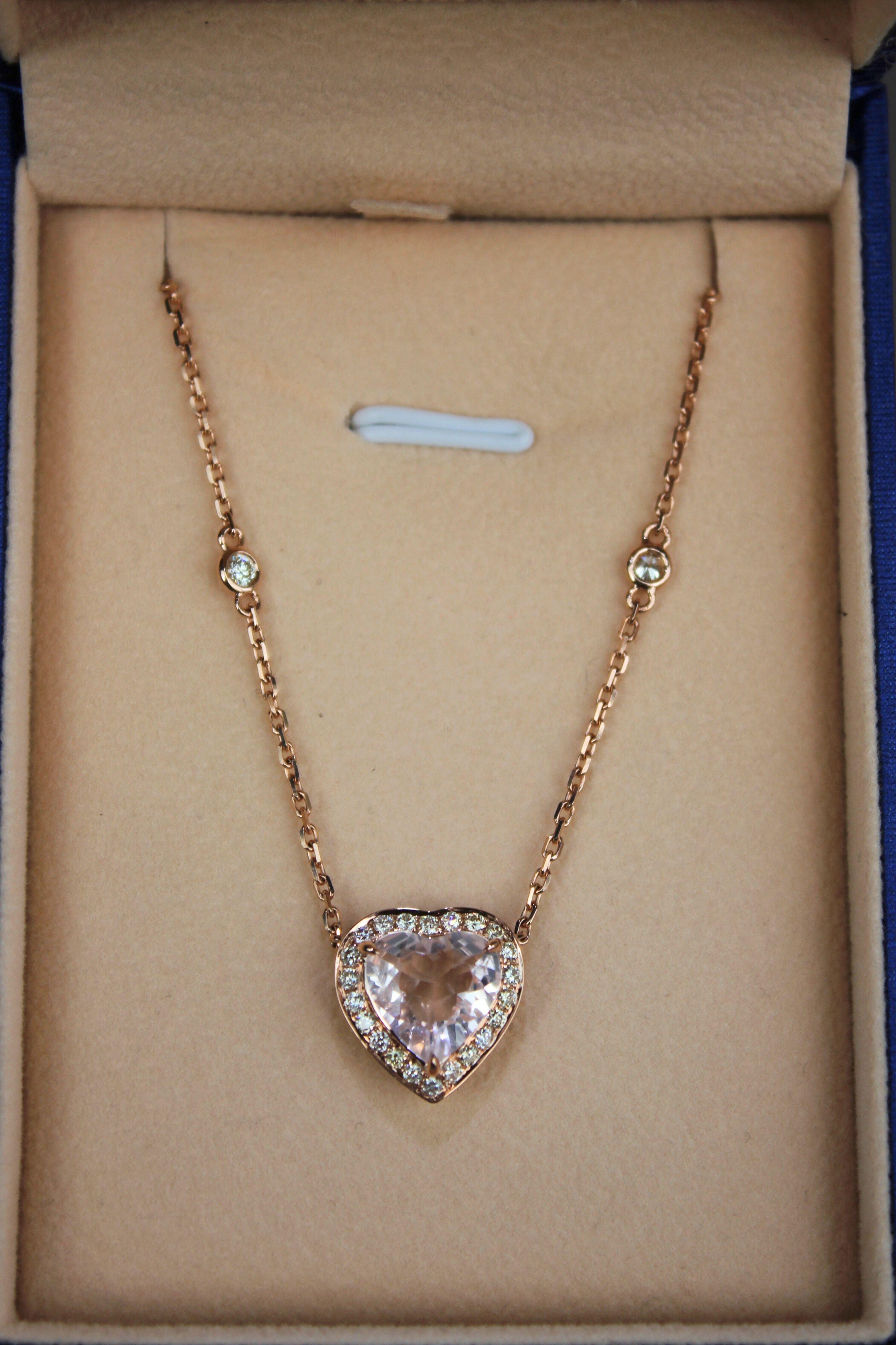 Embrace the refined beauty of this exquisite gemstone heart-shape pendant necklace.  Crafted with solid 18K gold and intricate detailing, the necklace features the highest-quality faceted diamond-cut chain that gracefully holds a natural brilliant