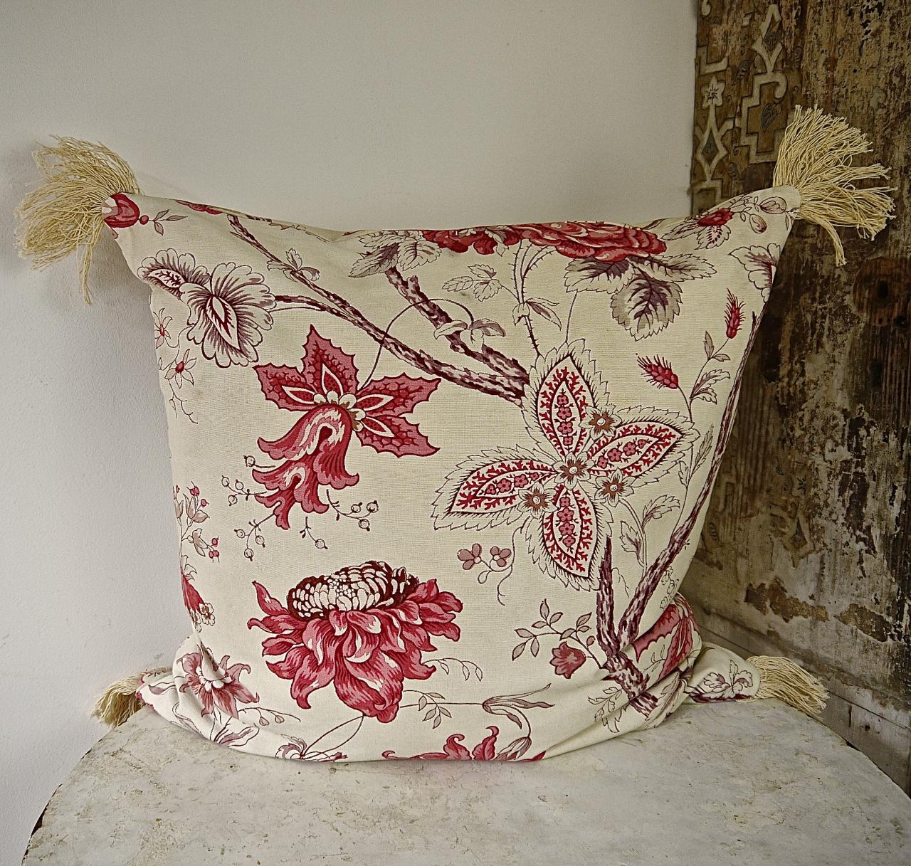 French early 20th century large scale pink and red roses with stylized flowers and leaves on meandering branches cushion. With vintage cotton fringing at each corner. Self-backed and slip-stitched closed with a duck feather insert.
