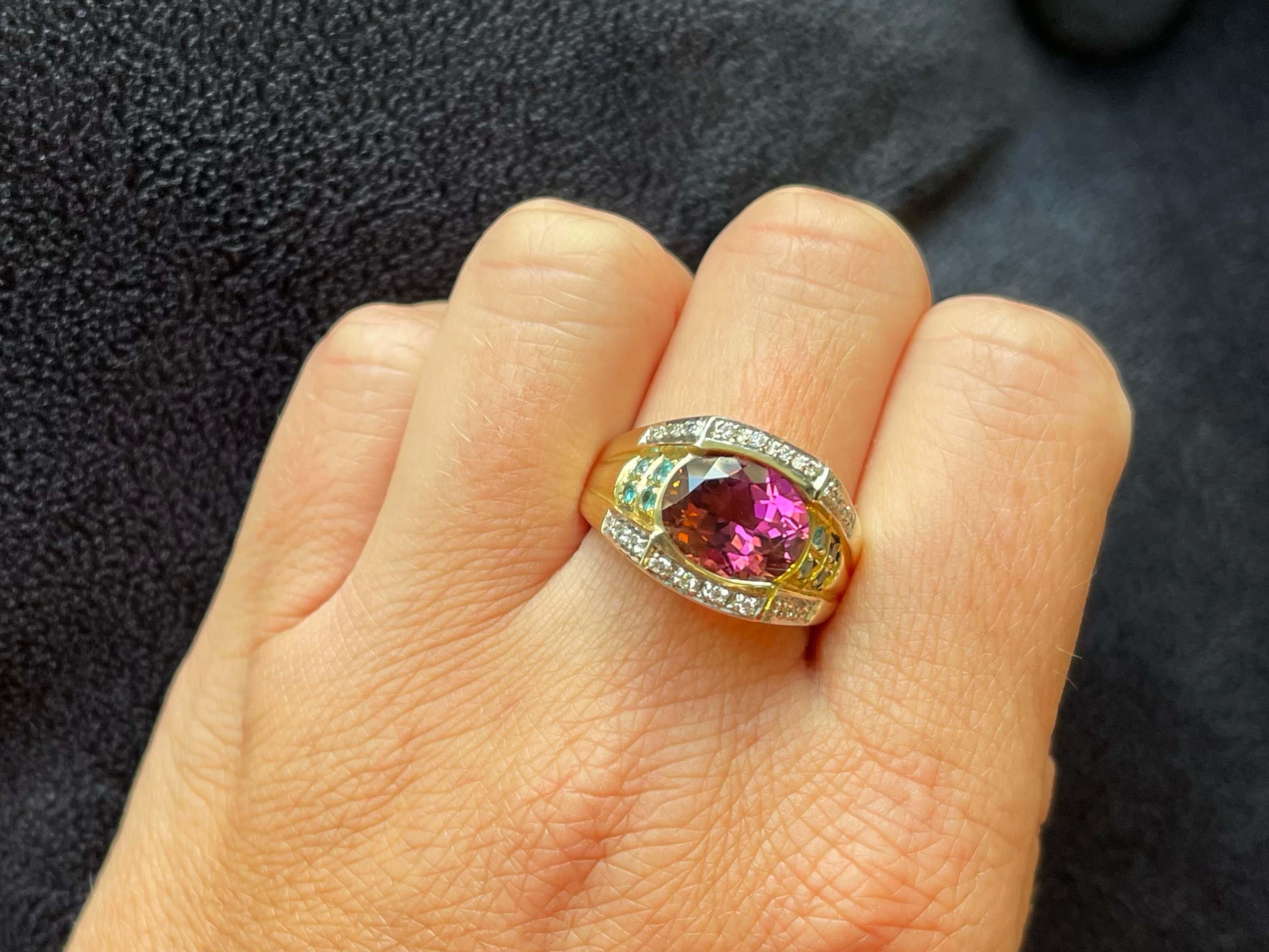 Item Specifications:

Metal: 14K Yellow Gold

Style: Statement Ring

Ring Size: 8.75 (resizing available for a fee)
​
​Ring Height: 13.86 mm

Total Weight: 8.0 Grams

Gemstone Specifications:

Gemstones: 1 Pink rubellite garnet

Garnet Carat Weight: