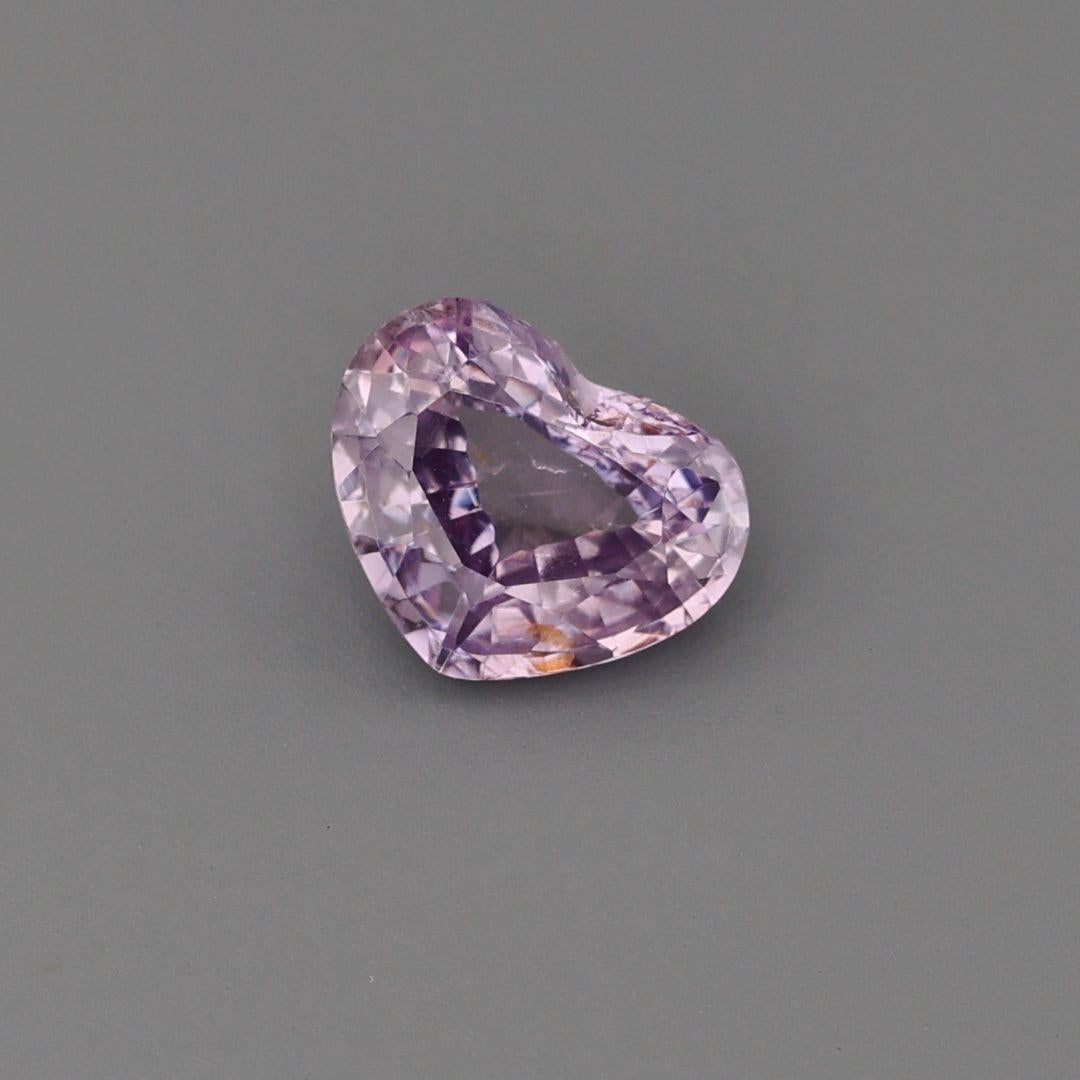 A Natural Ceylon Unheated Pink Sapphire with a dominant hue of Pink. Cut into a Heart shape, this stone weighs almost 1.45 carats.

• Variety: Sapphire
• Color(s): Pink
• Shape/Cutting Style: Heart
• Cut: Good
• Dimensions: 9.3mm x 8mm x 5mm
•