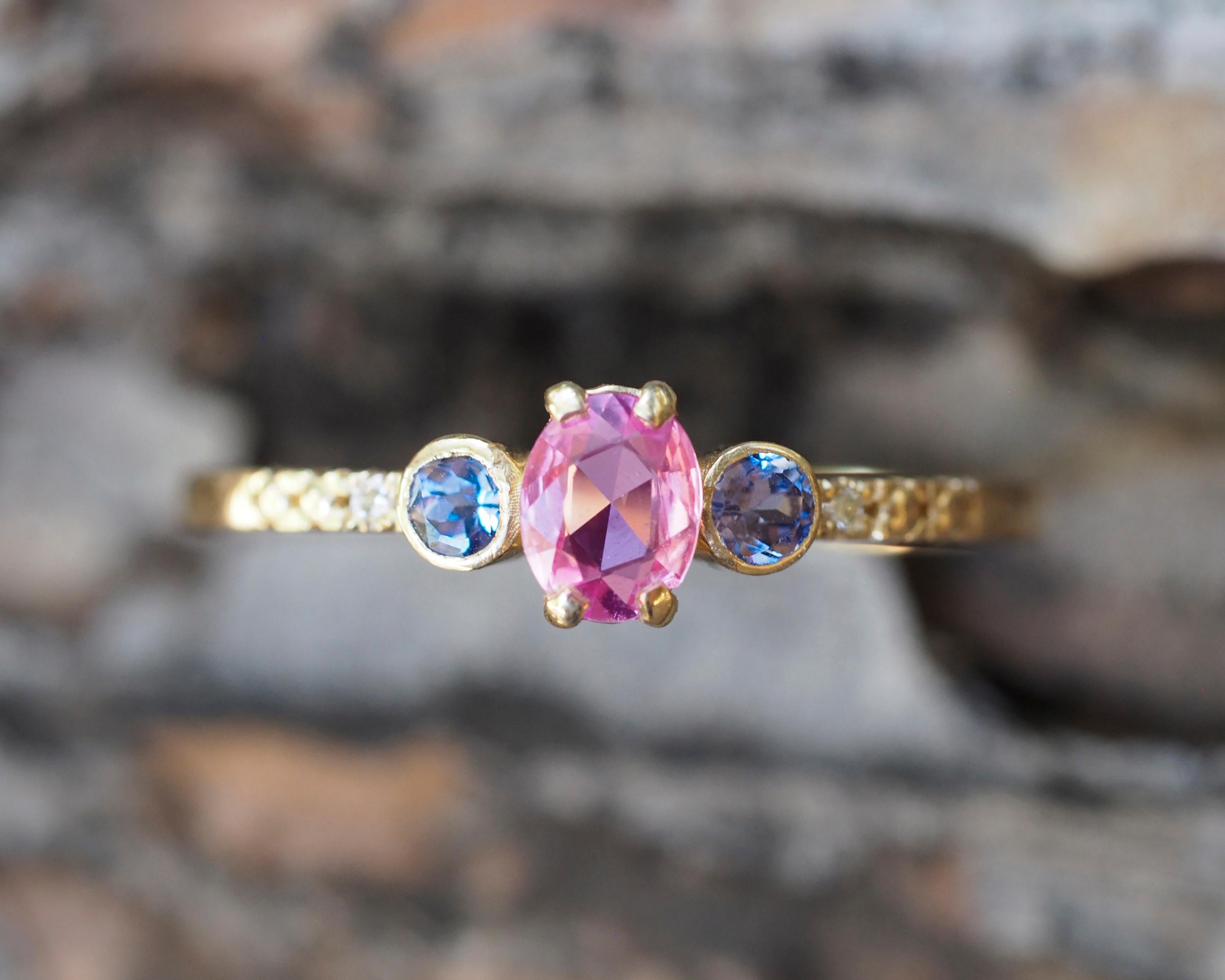 Pink sapphire 14k gold ring. 
Three gemstone ring. Tiny sapphire gold ring. Oval Sapphire ring. September birthstone ring.

Metal: 14k gold
Weight 1.65 gr. depends from size.

Gemstones:
Sapphire: oval shape, light pink, Si clarity, 1 piece 0.45