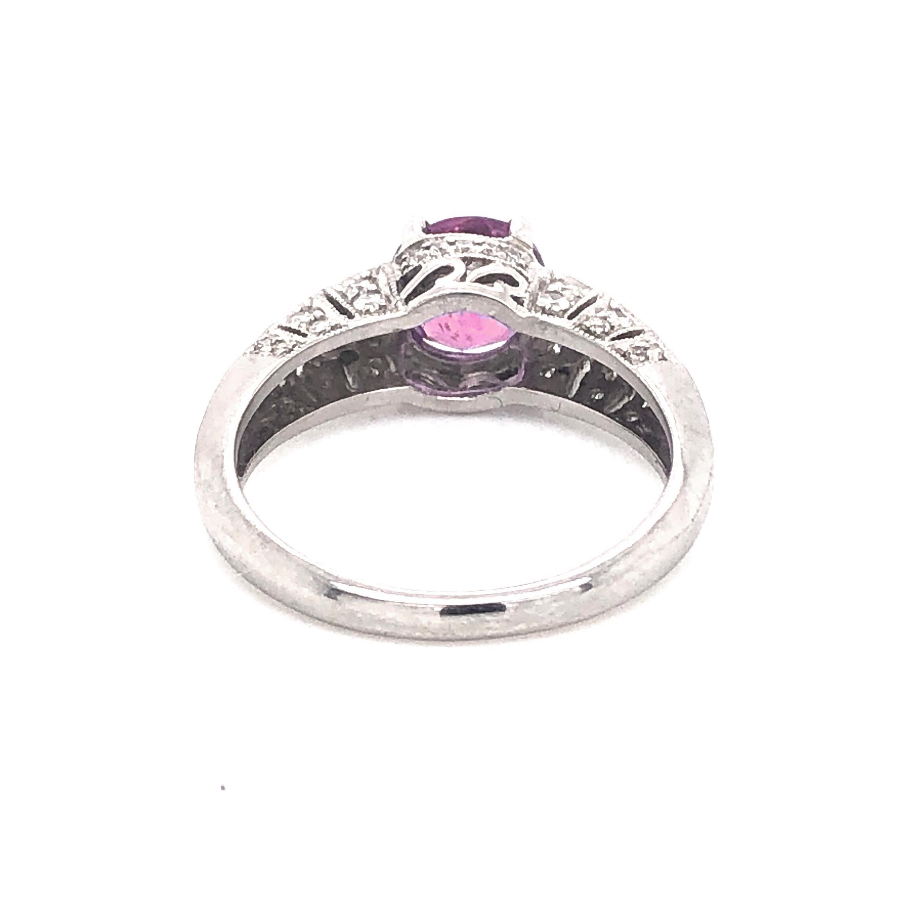 Modern Pink Sapphire 1.57 Carats and Diamond Platinum Ring, Circa 2009 For Sale