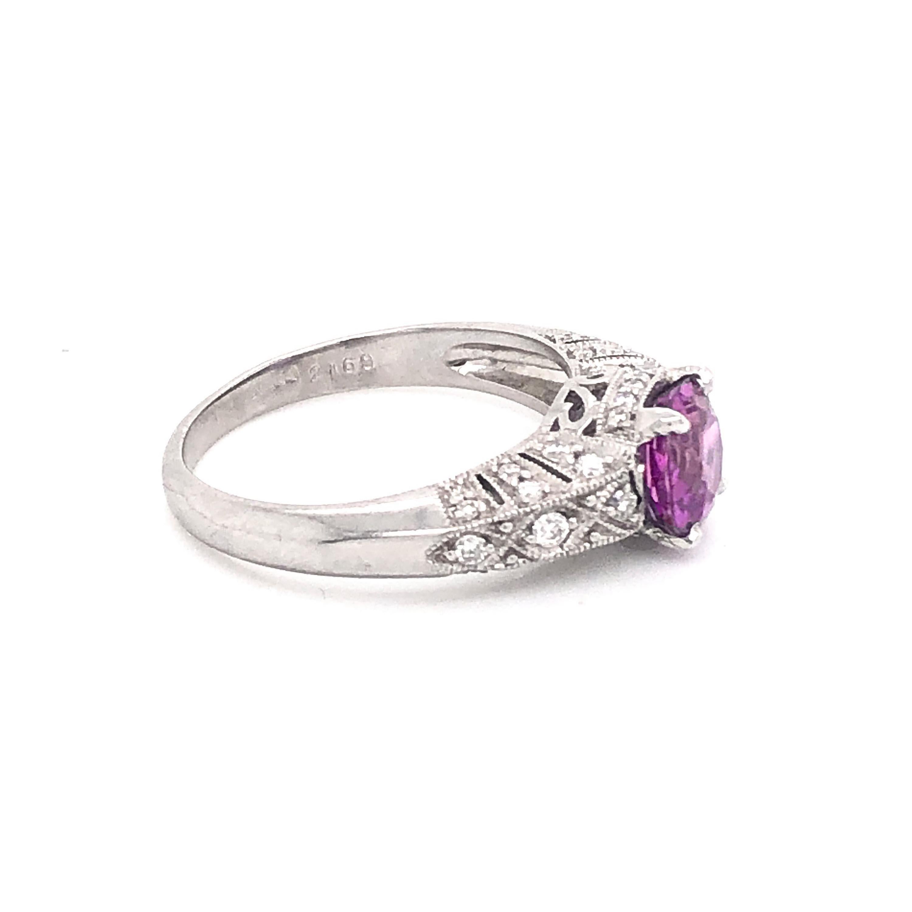 Round Cut Pink Sapphire 1.57 Carats and Diamond Platinum Ring, Circa 2009 For Sale